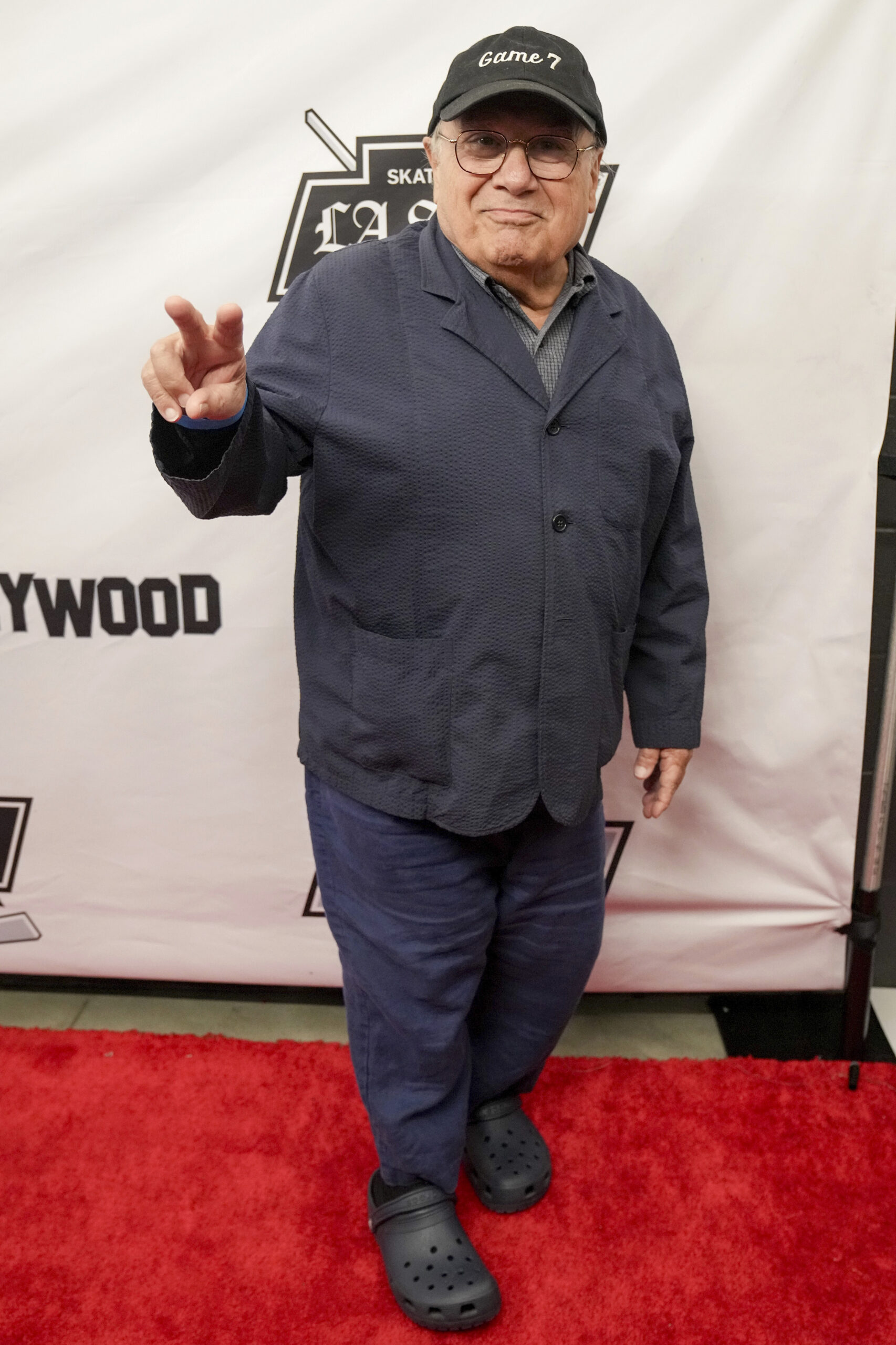 Team Blue coach actor Danny DeVito arrives during the Skate...