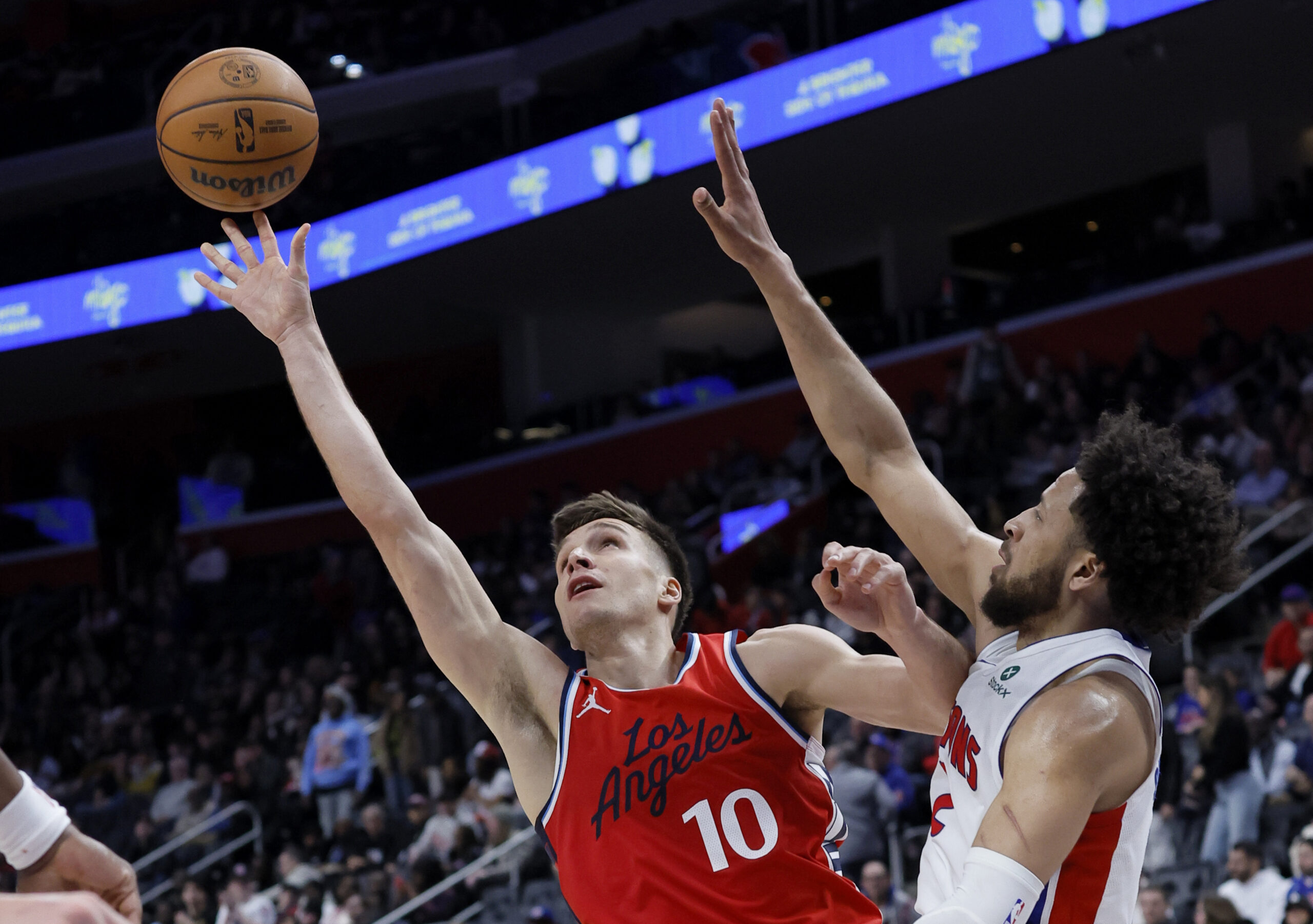 Clippers guard Bogdan Bogdanovic (10) gets a shot off against...