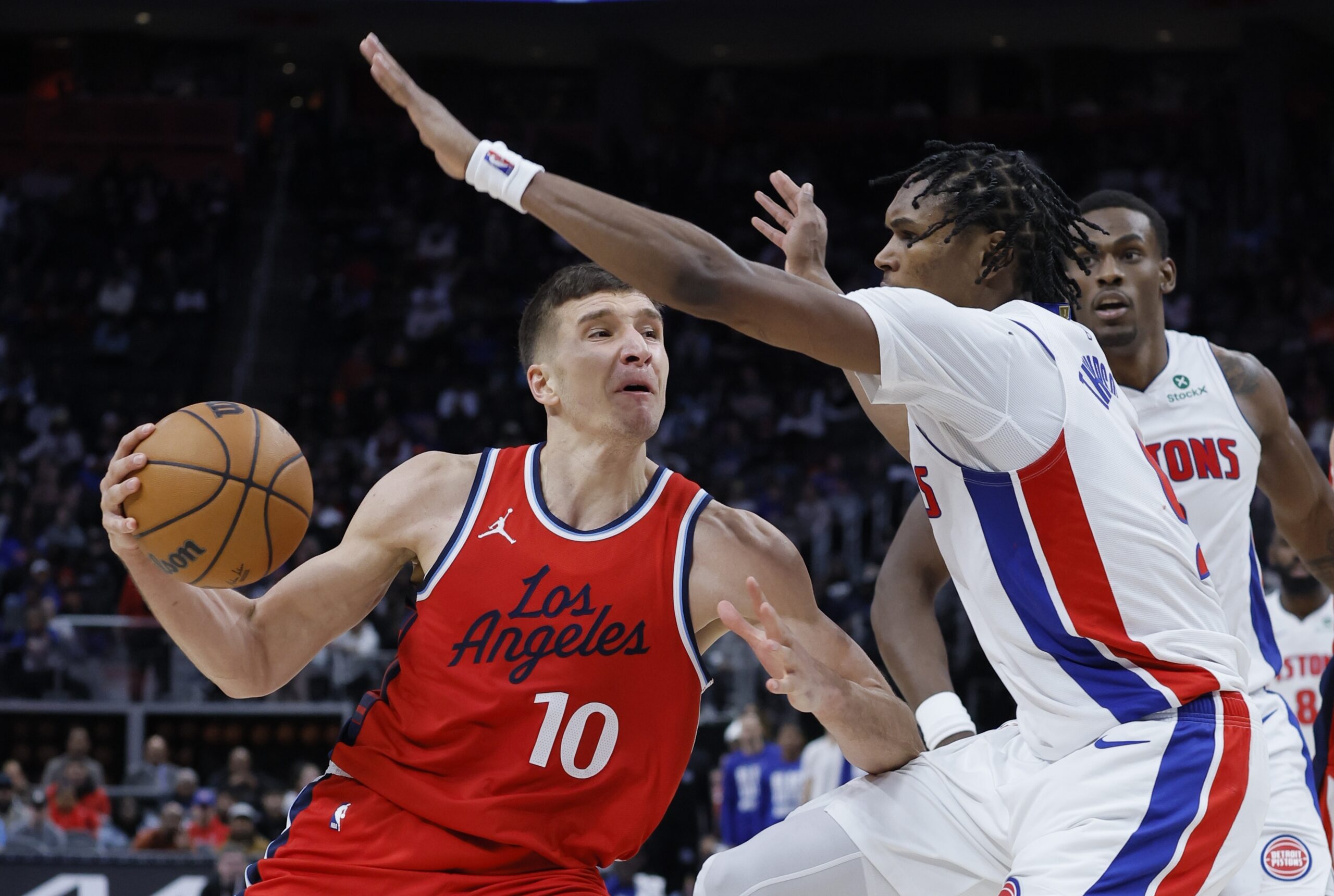 Clippers guard Bogdan Bogdanovic looks to pass the ball as...