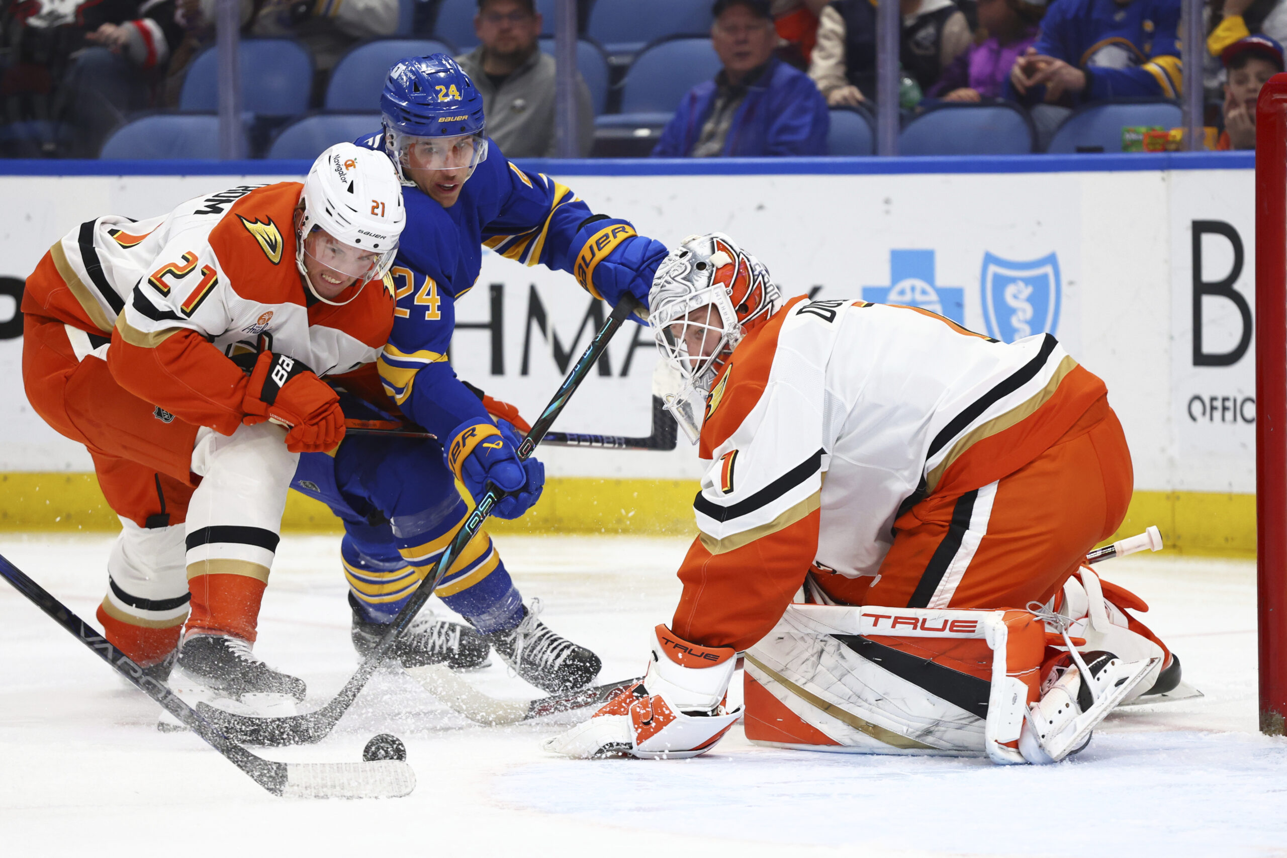 Buffalo Sabres center Dylan Cozens (24) is stopped by Ducks...