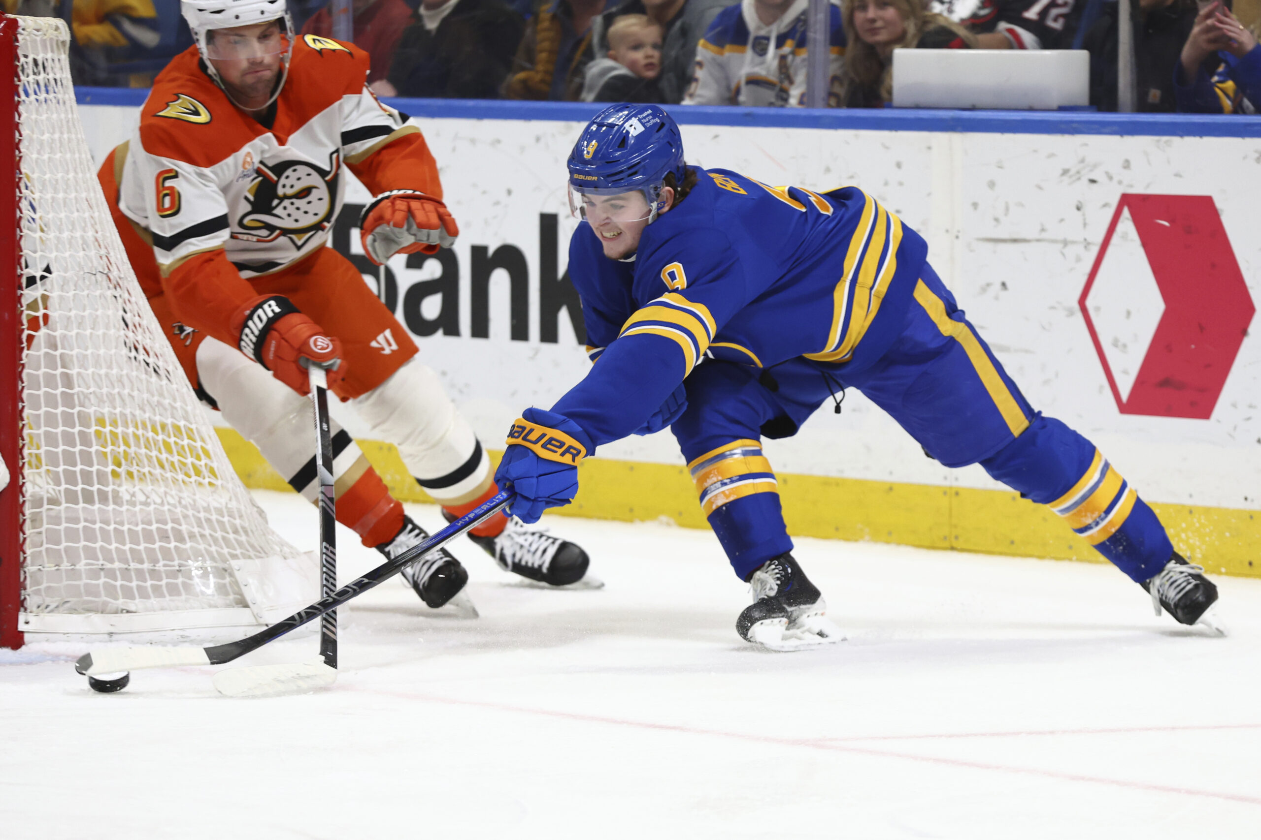 Buffalo Sabres left wing Zach Benson (9) carries the puck...