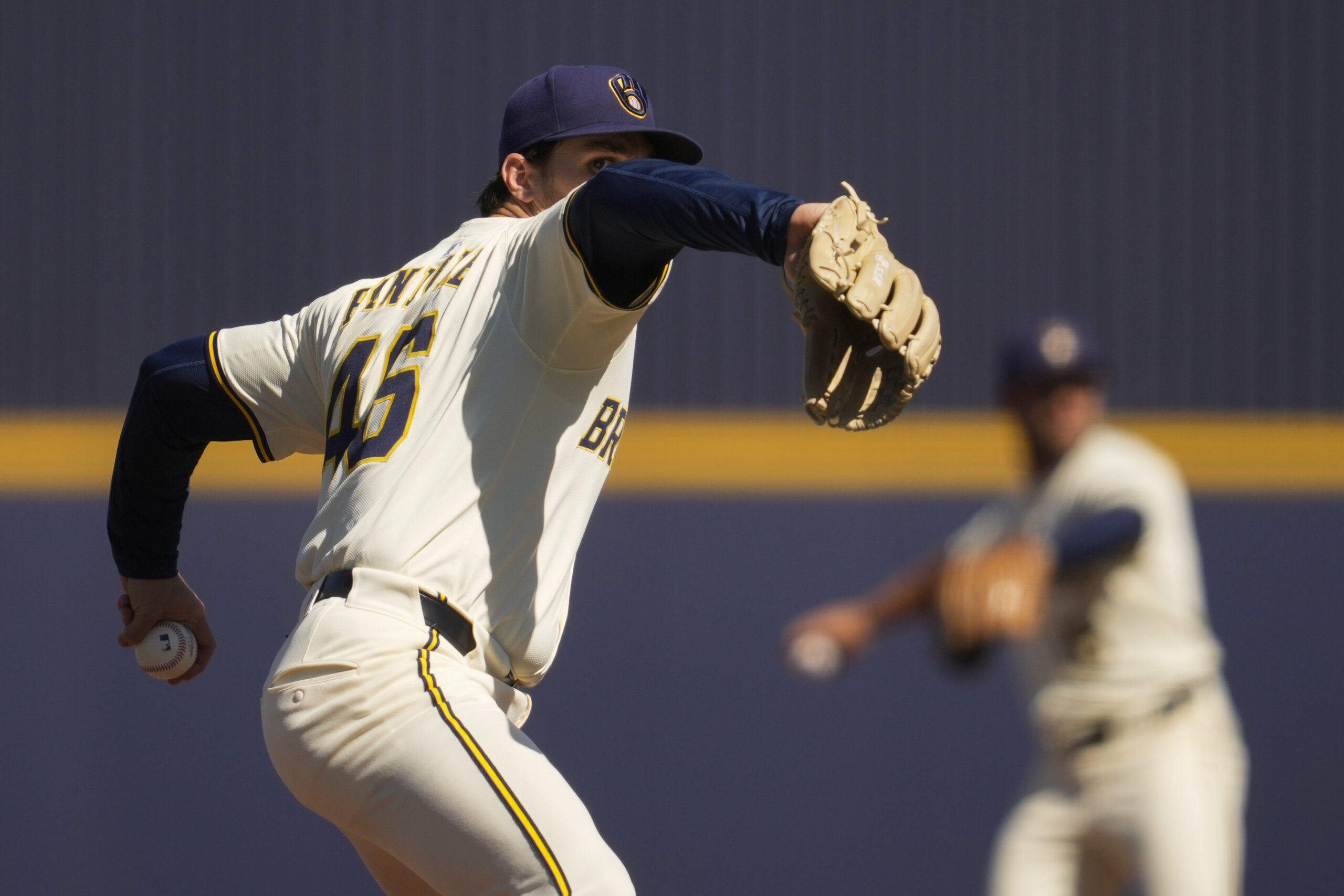 Milwaukee Brewers starting pitcher Thomas Pannone warms up during the...