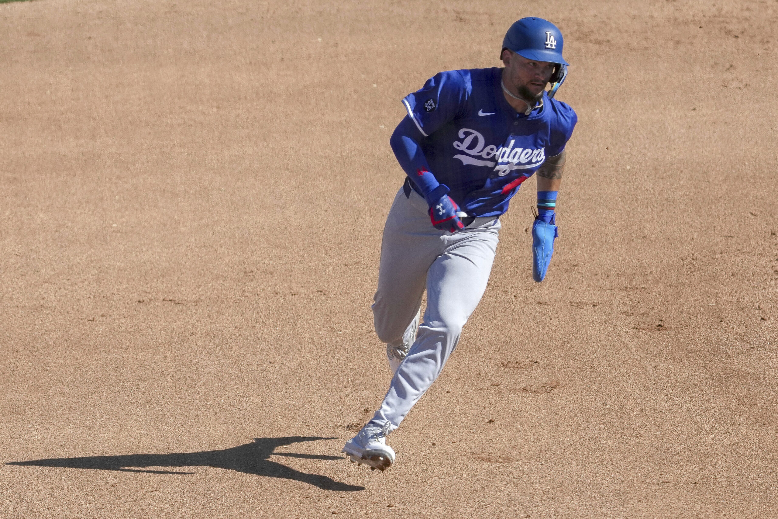 The Dodgers’ Andy Pages rounds second base during in the...