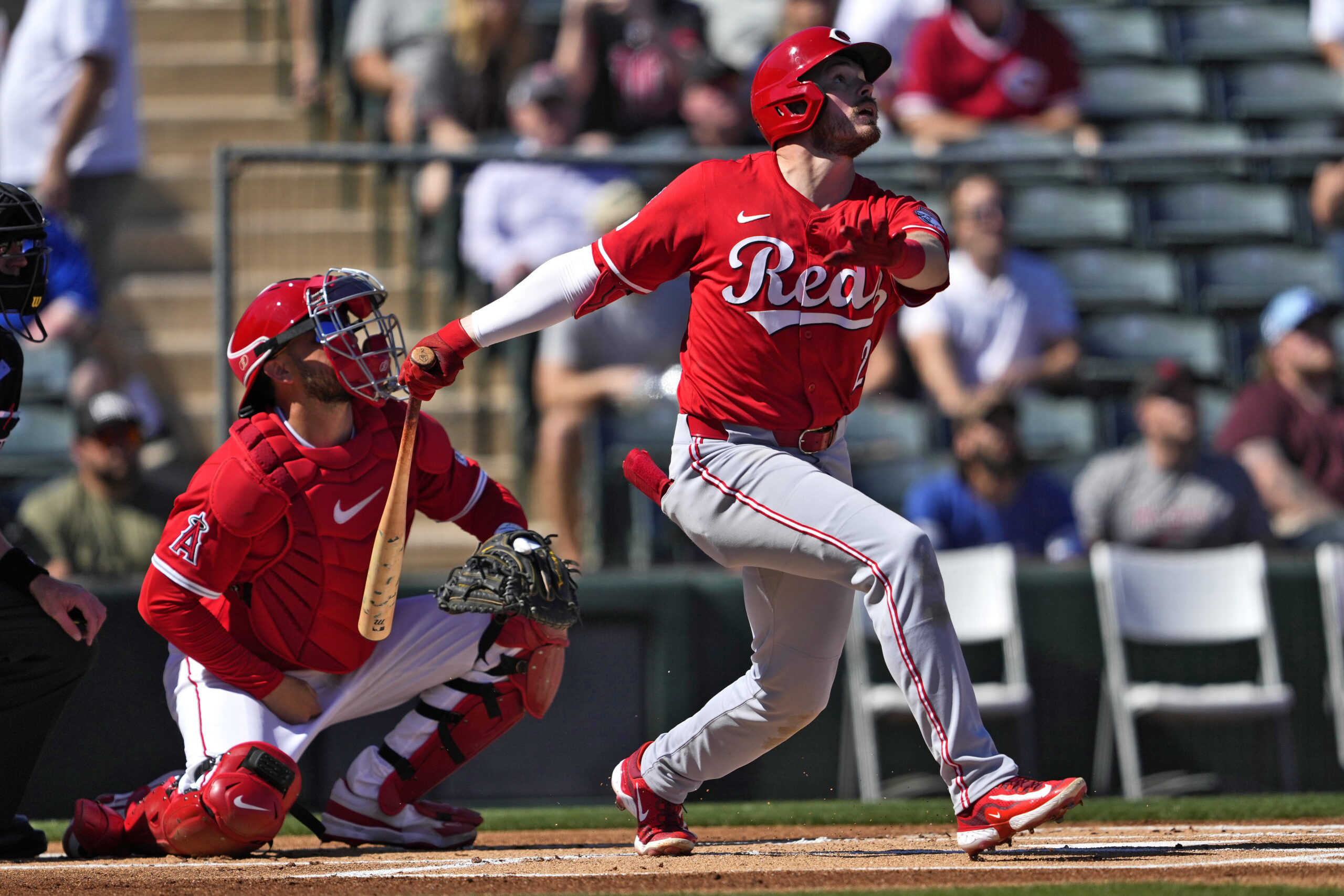 The Cincinnati Reds’ Gavin Lux hits against the Angels during...