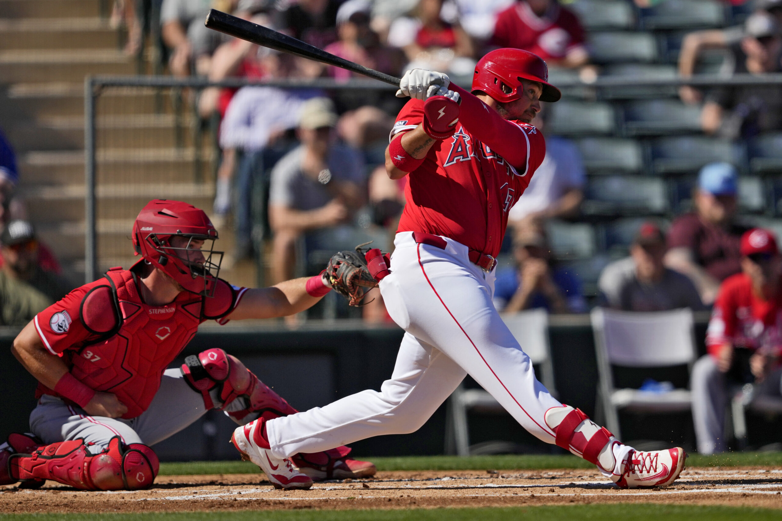 The Angels’ Ryan Noda hits against the Cincinnati Reds during...