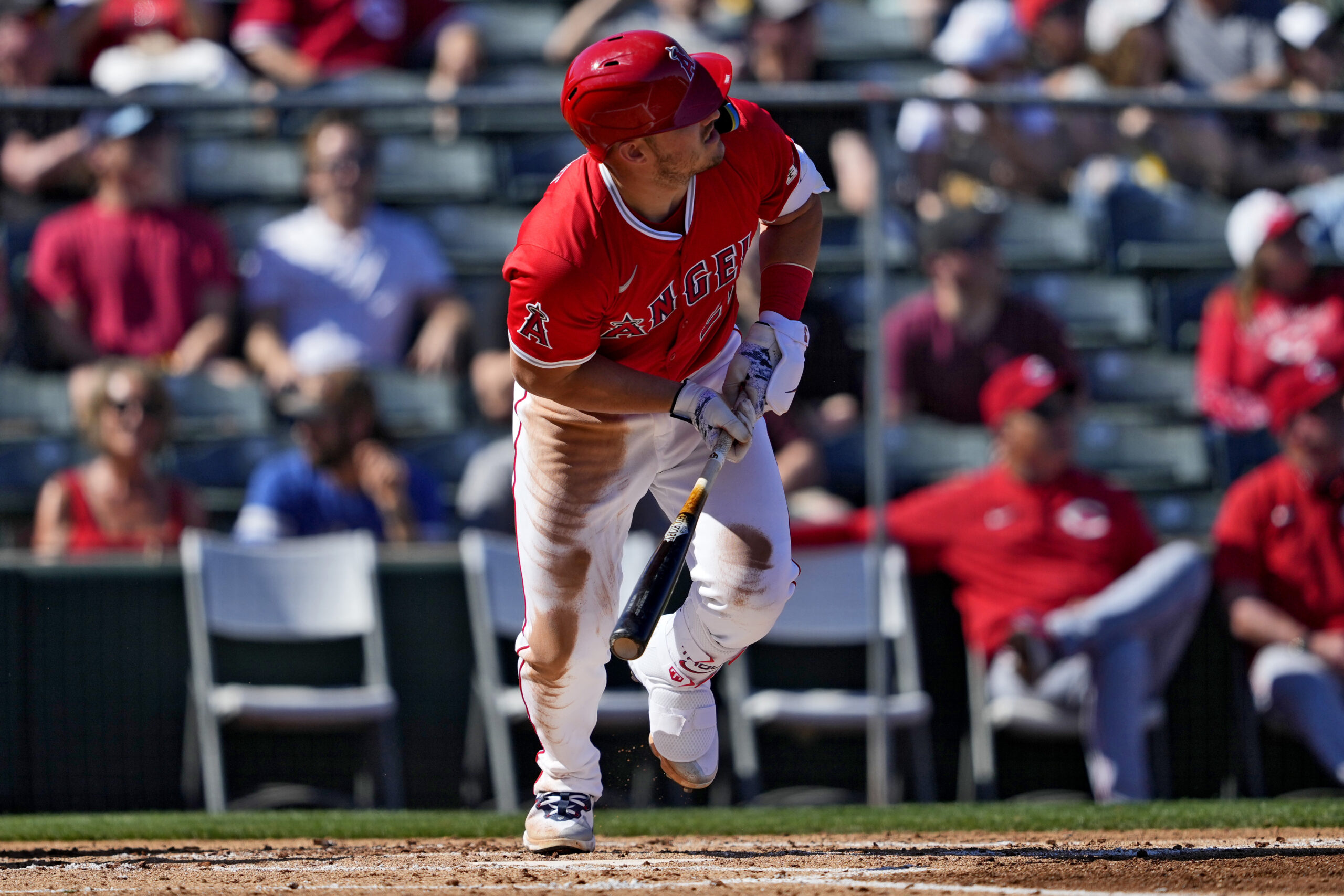 Angels star Mike Trout watches his solo home run take...