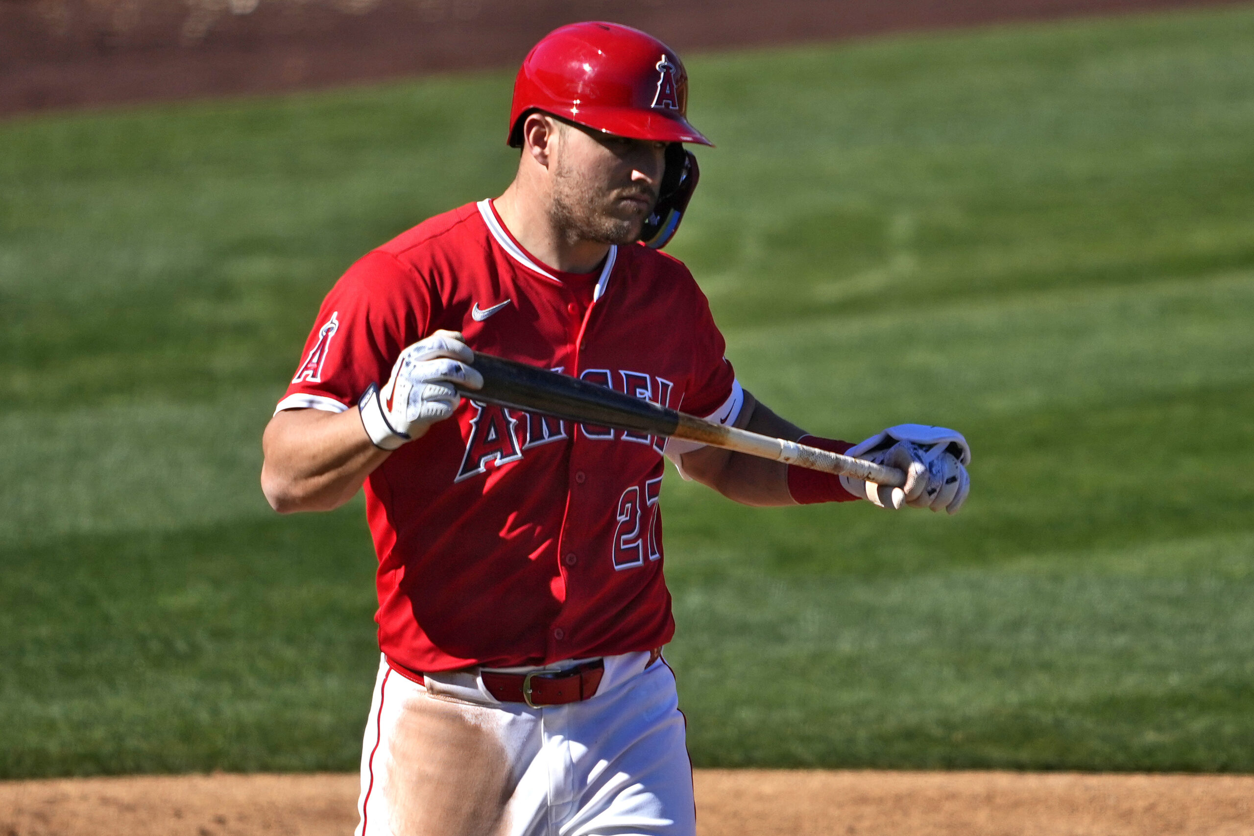 Angels star Mike Trout reacts to striking out against the...