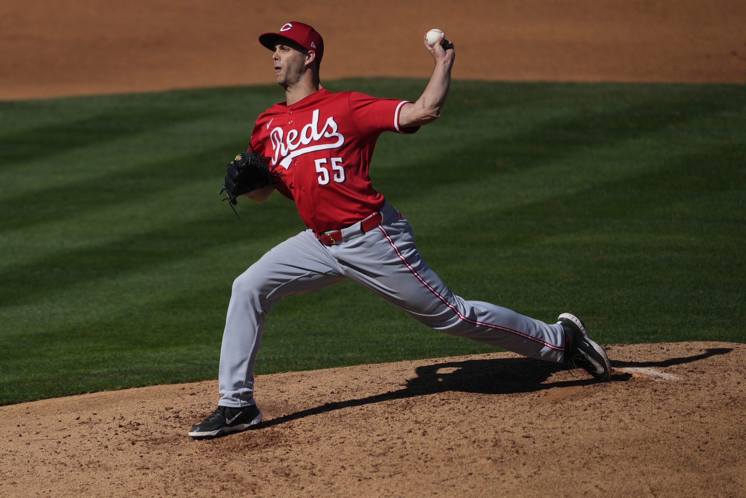 Cincinnati Reds pitcher Taylor Rogers throws against the Angels during...