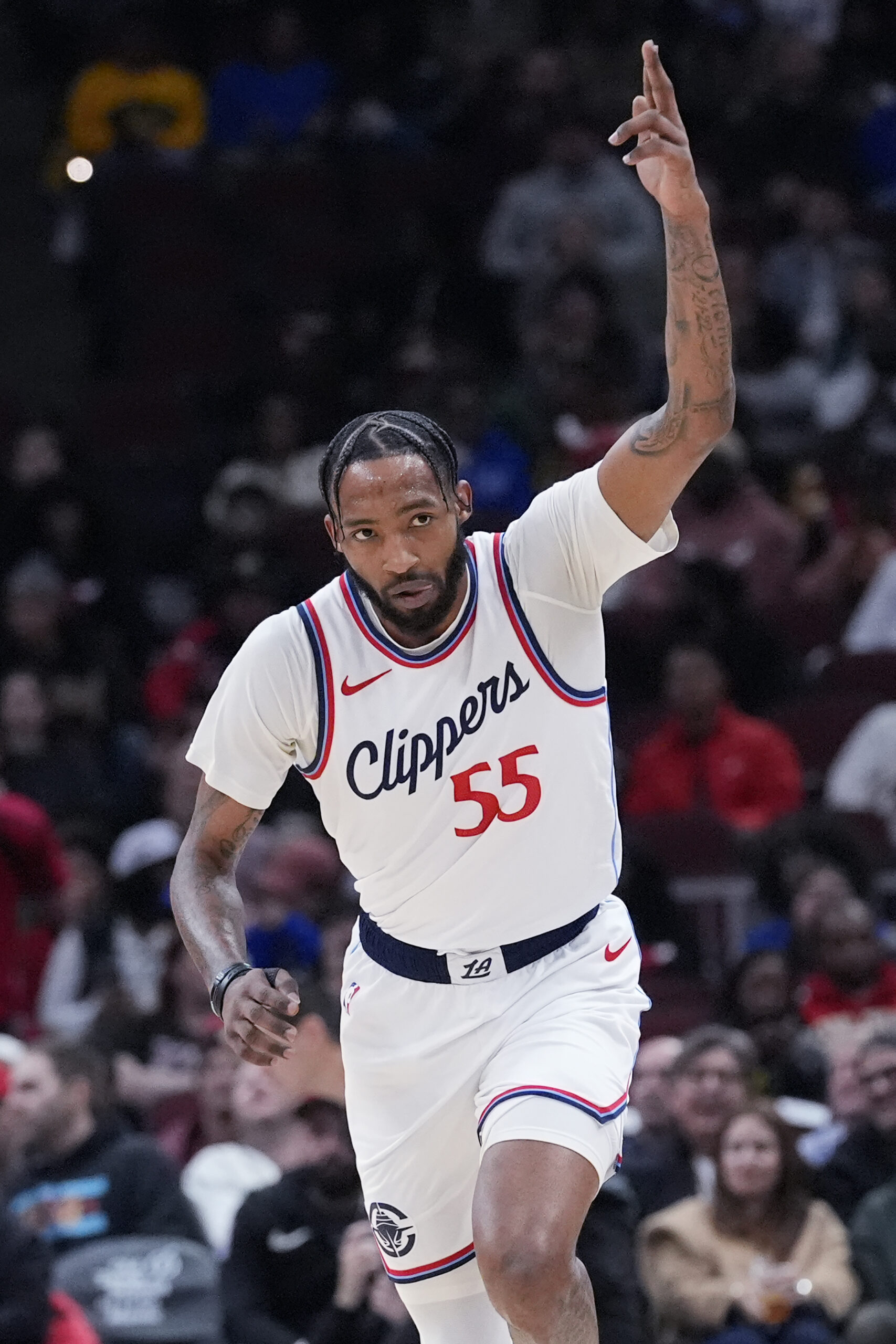 Clippers forward Derrick Jones Jr., reacts after making a 3-point...