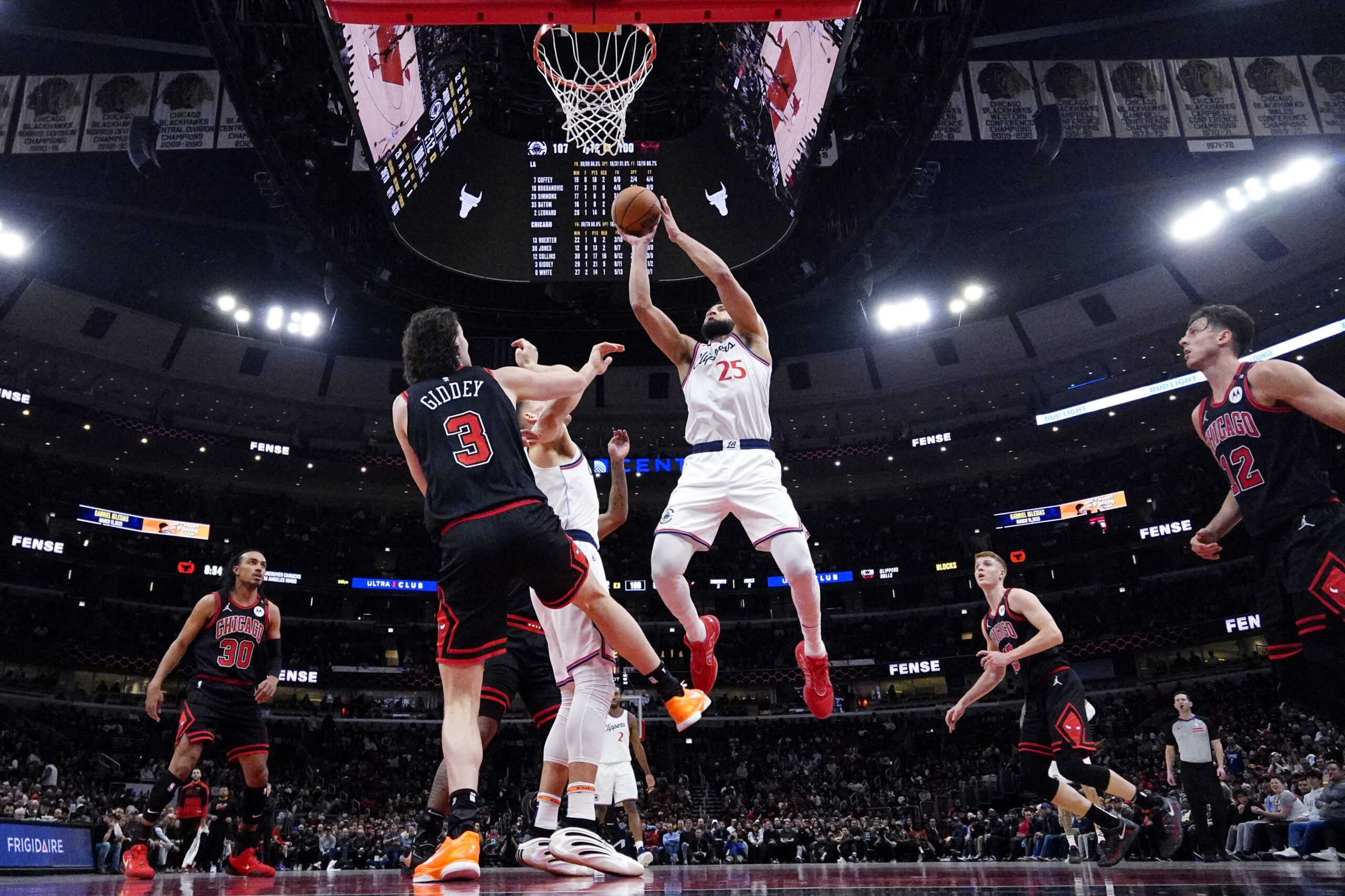 Clippers guard Ben Simmons (25) goes up for a shot...