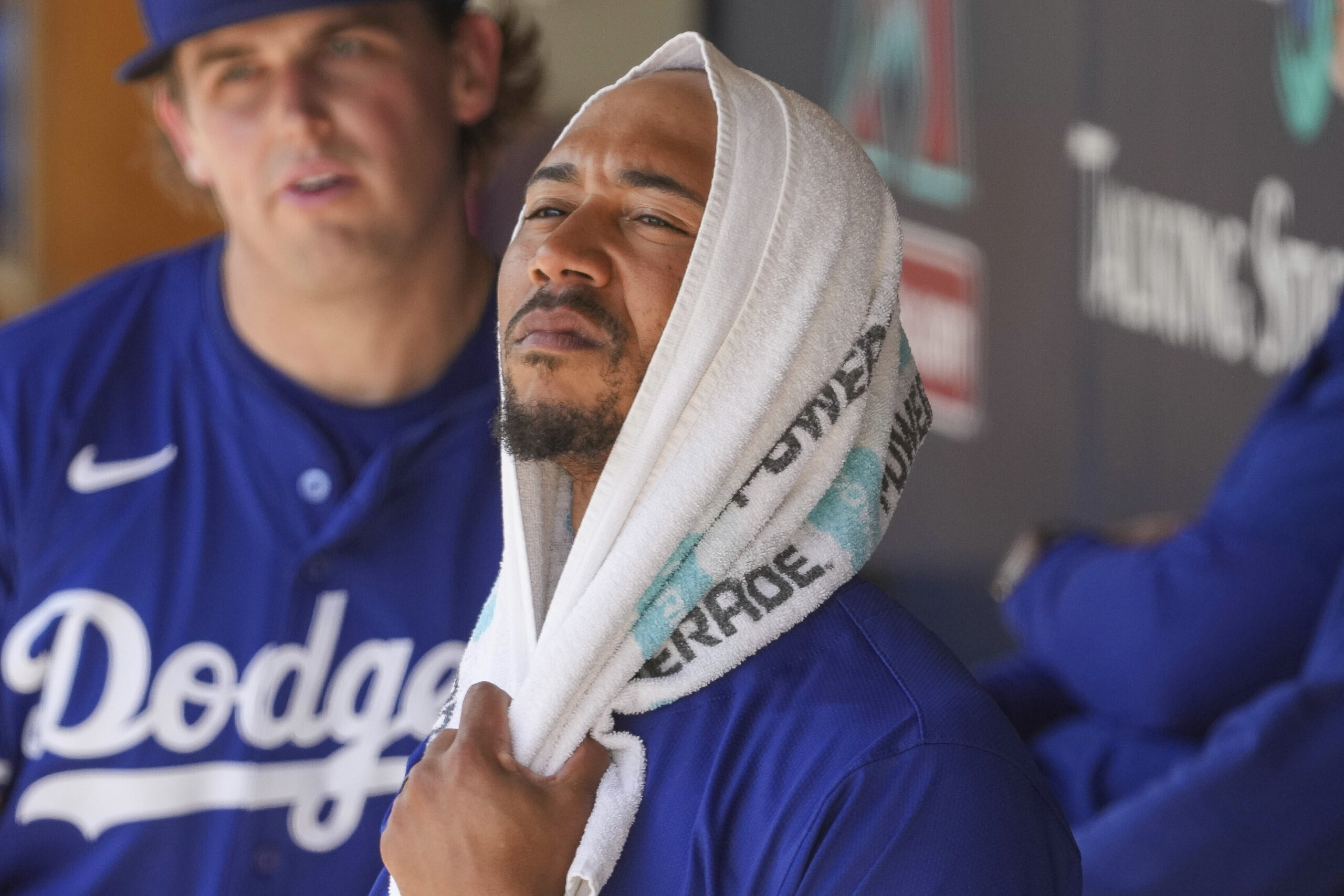 Dodgers star Mookie Betts watches a strike challenge from the...