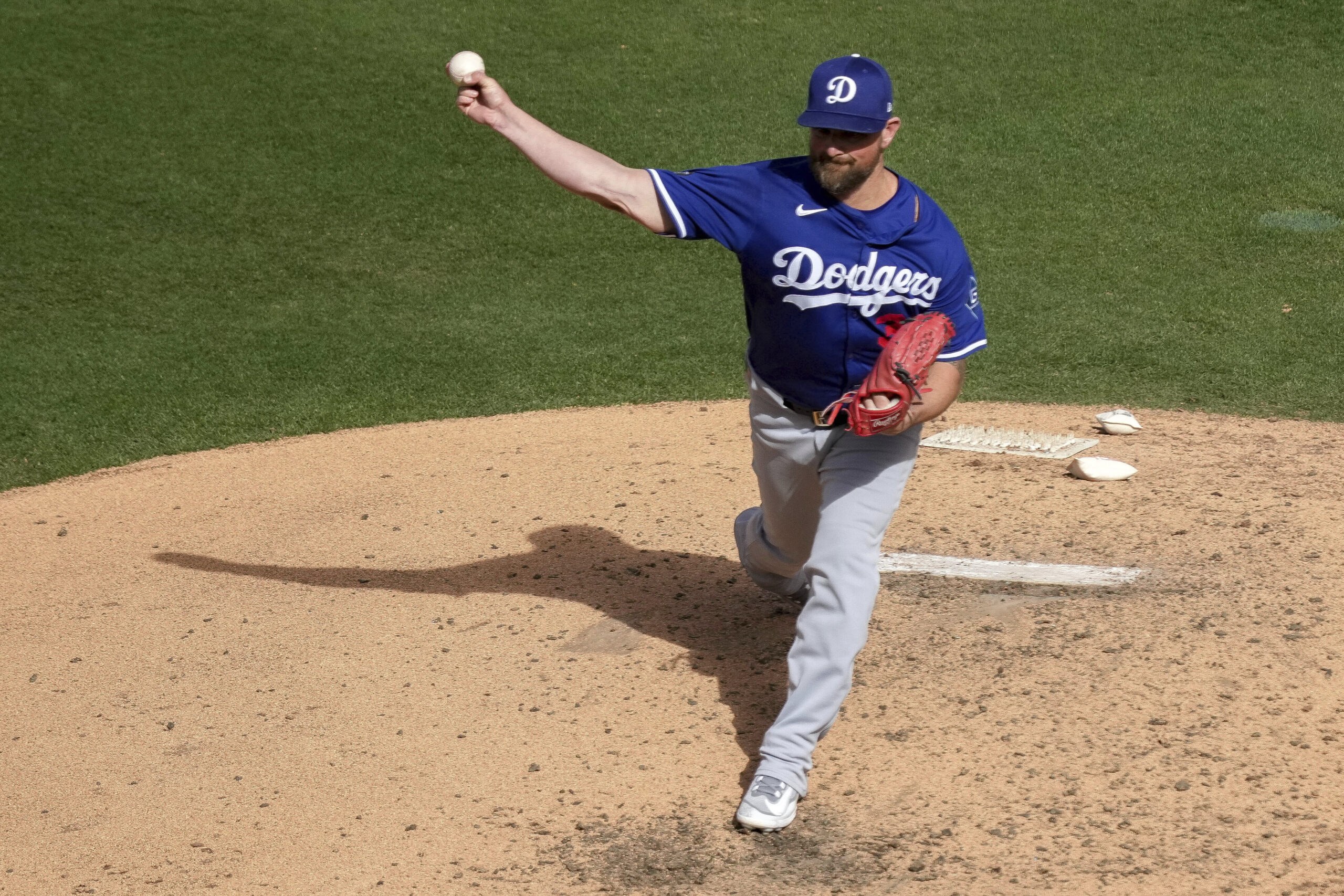 Dodgers pitcher Kirby Yates throws in the fifth inning of...