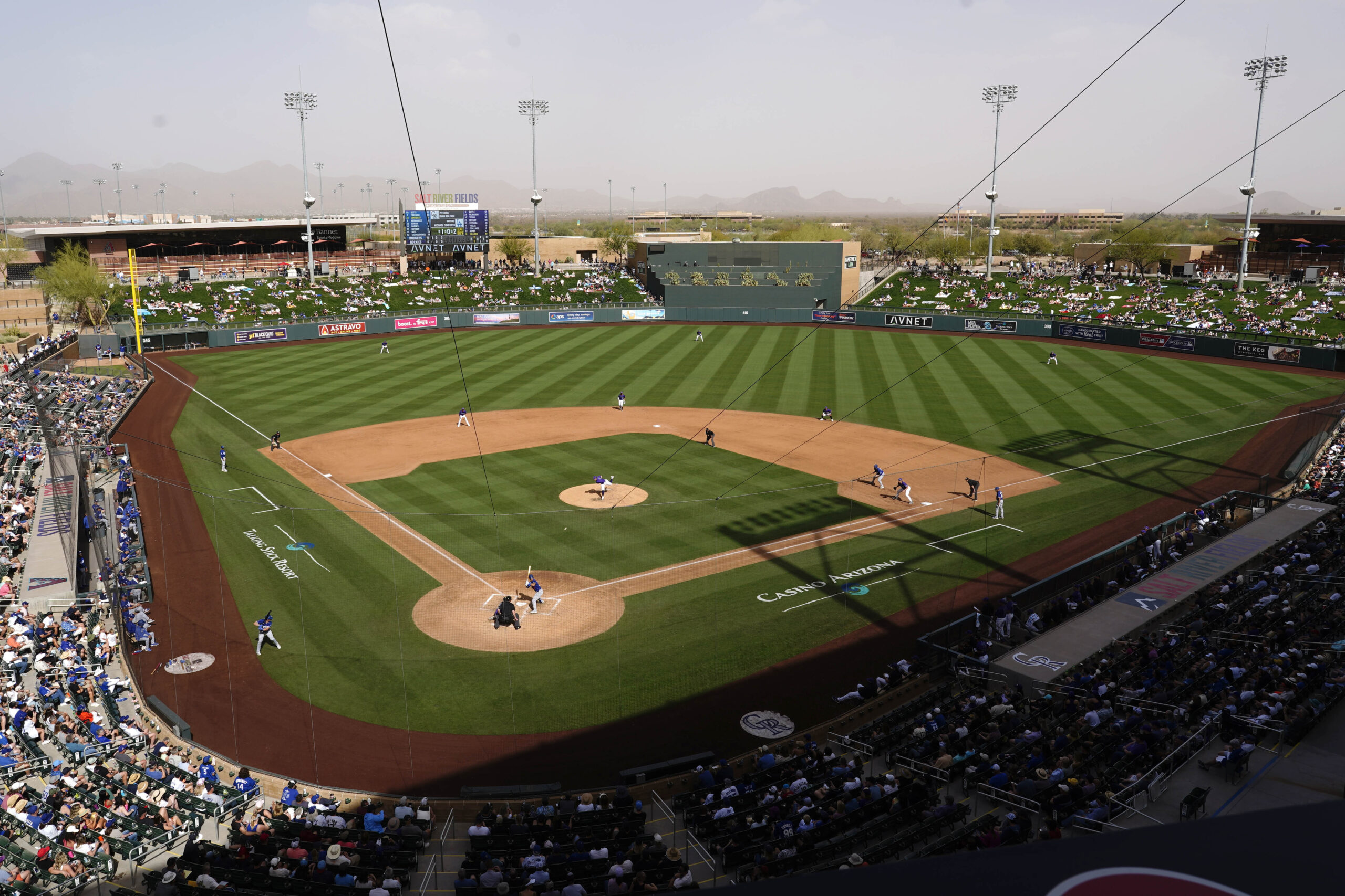 The Dodgers and Colorado Rockies play during the fifth inning...