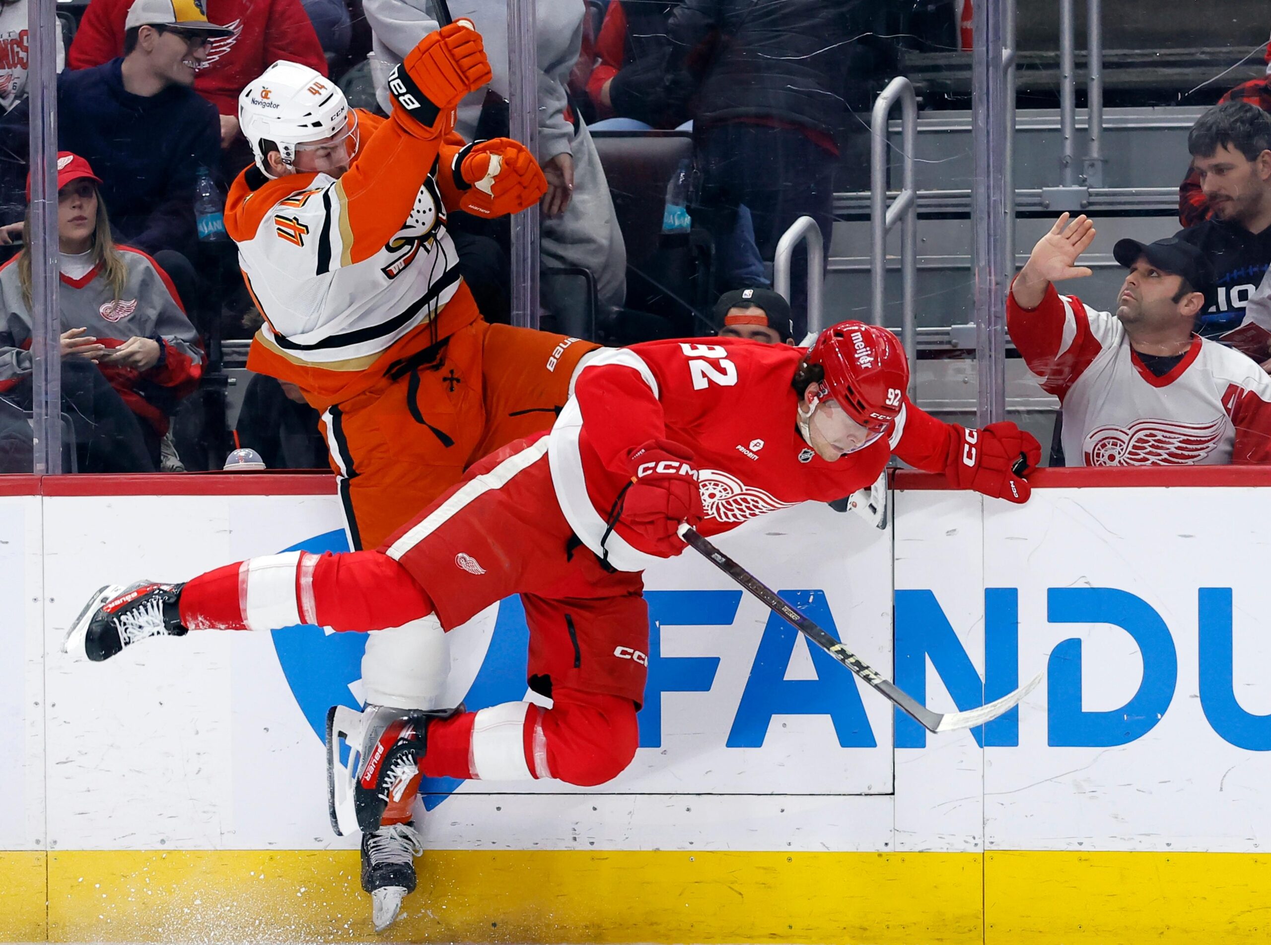 Ducks left wing Ross Johnston (44) collides with Detroit Red...