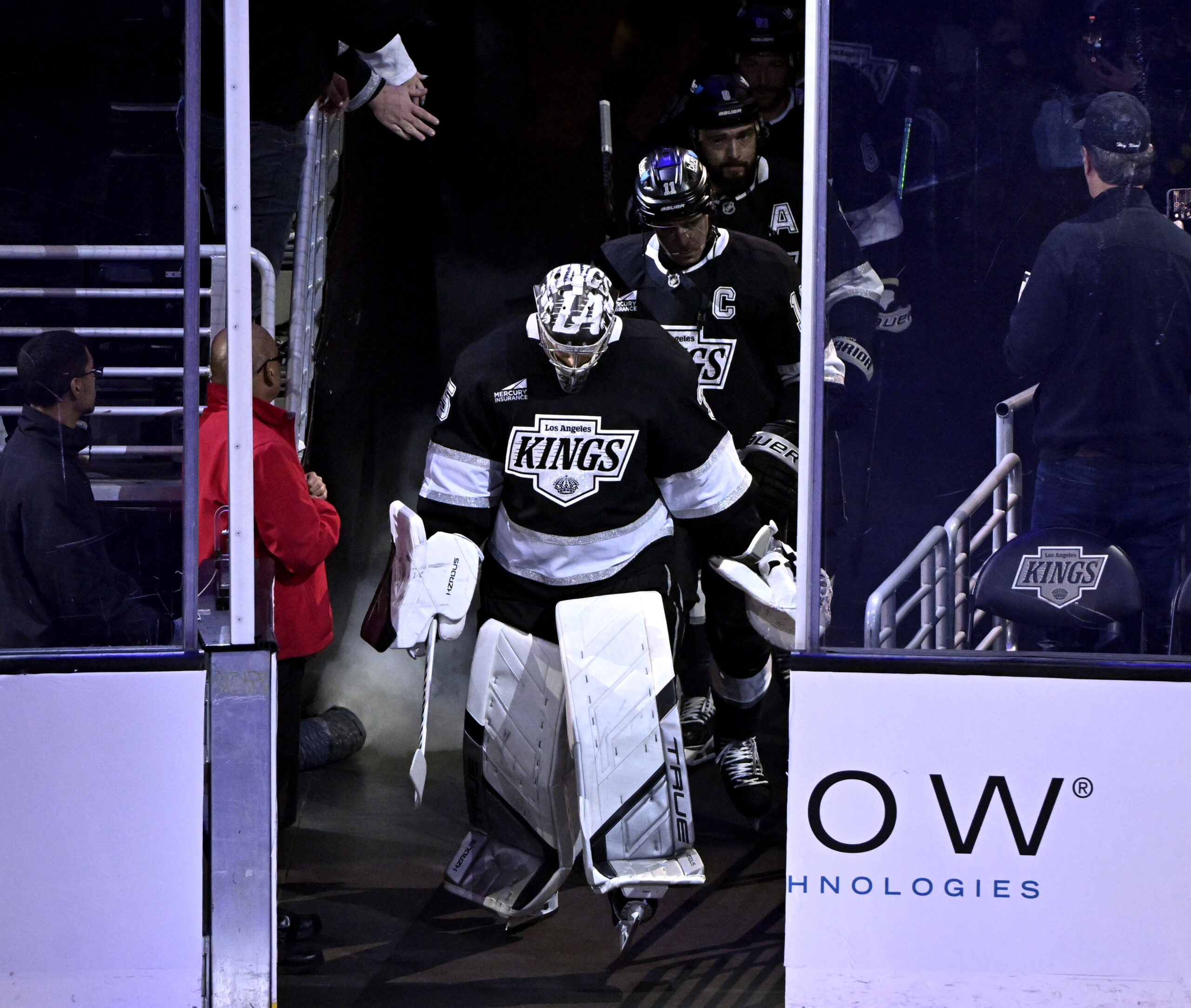 Goalie Darcy Kuemper #35 of the Kings walks onto the...