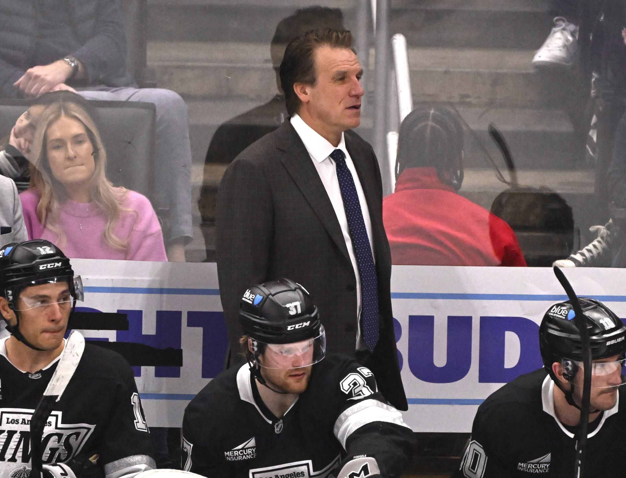 Head coach Jim Hiller of the Kings looks on against...