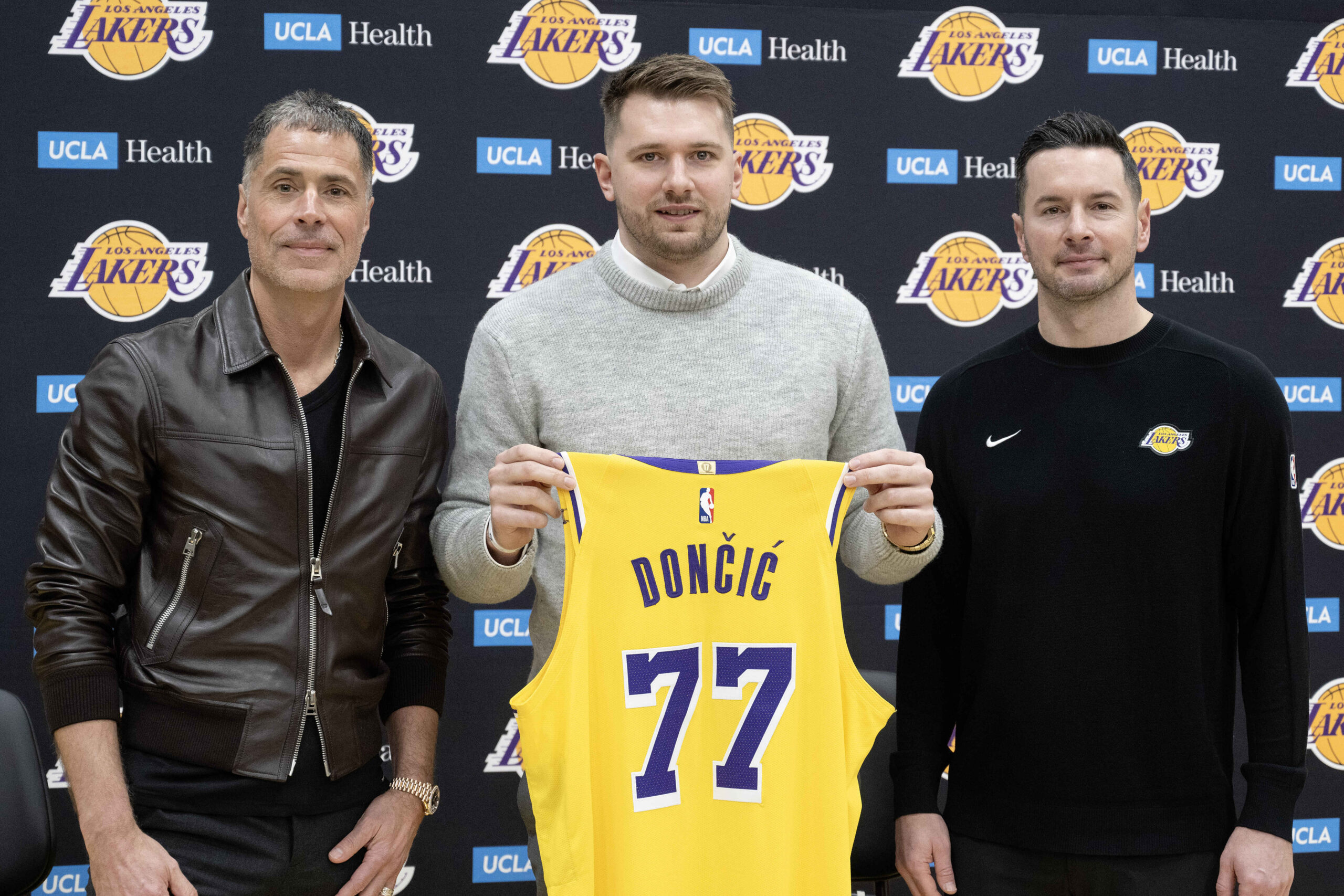 From left, Lakers general manager Rob Pelinka, Luka Doncic and...