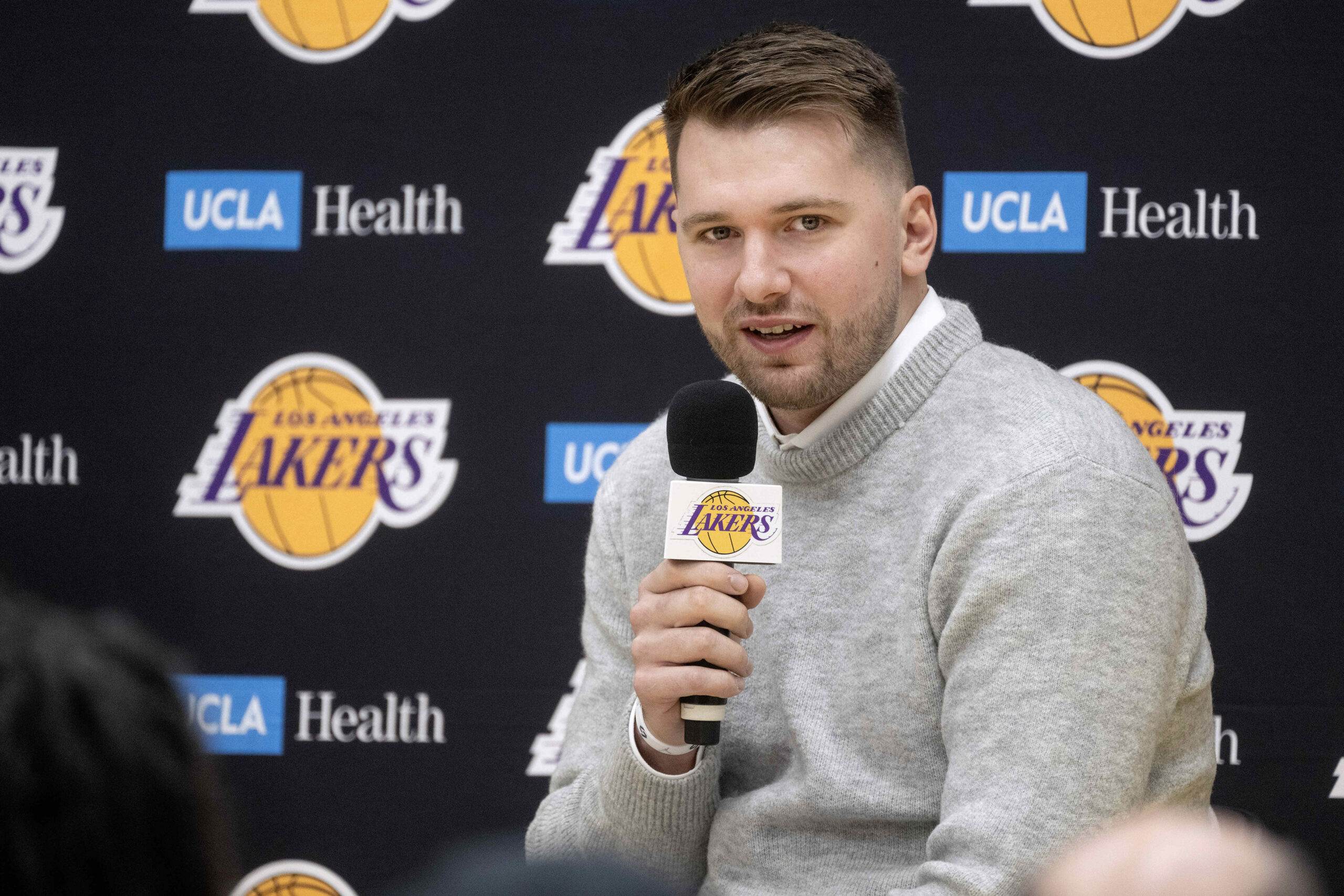 Lakers’ Luka Doncic speaks during a press conference at the...