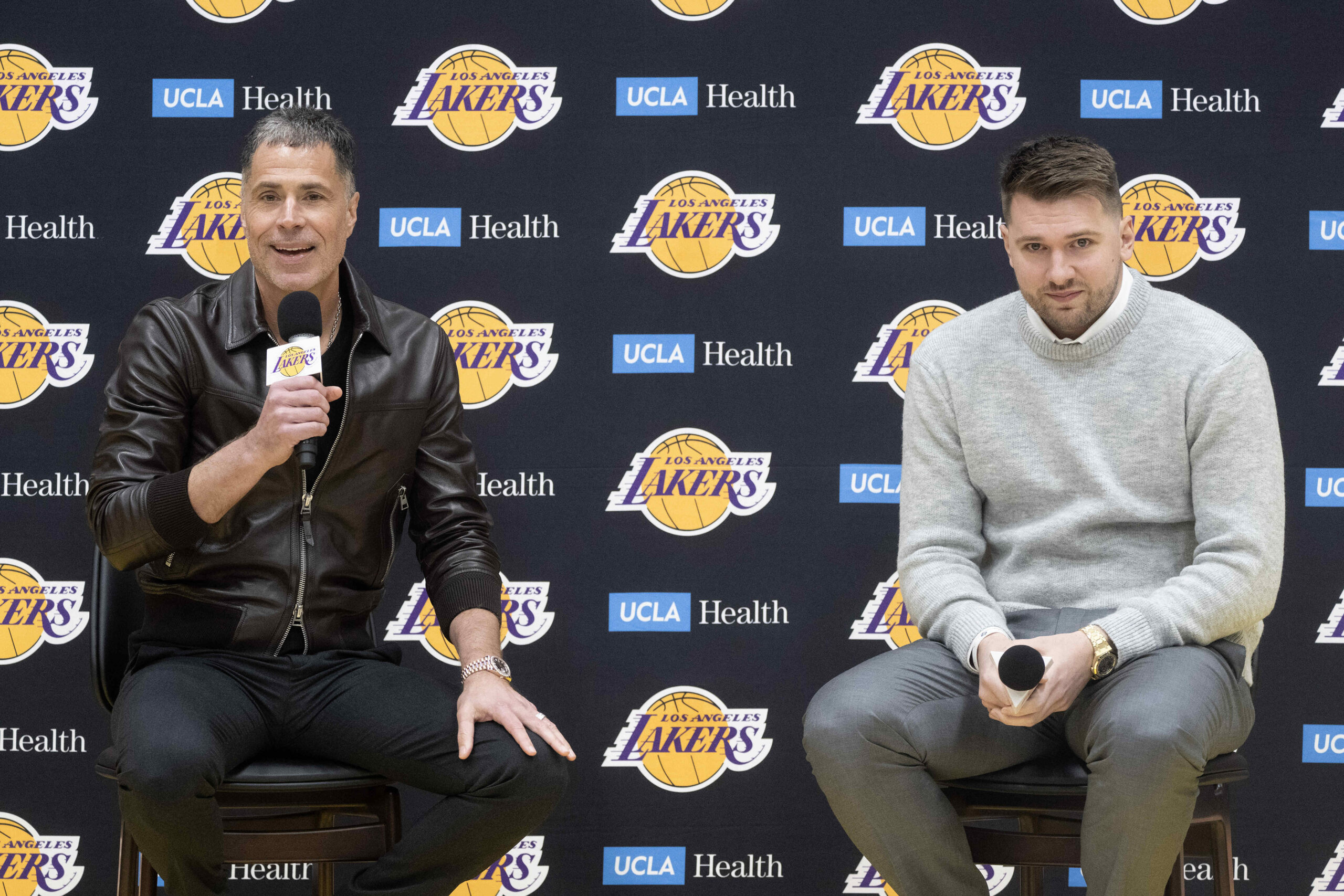 From left, Lakers general manager Rob Pelinka introduces Luka Doncic...