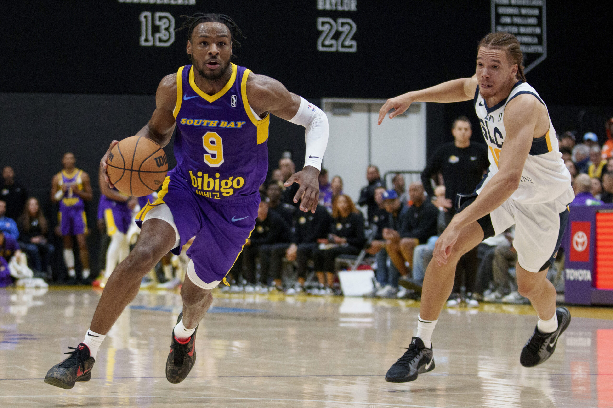 Lakers rookie Bronny James, shown handling the ball for the...