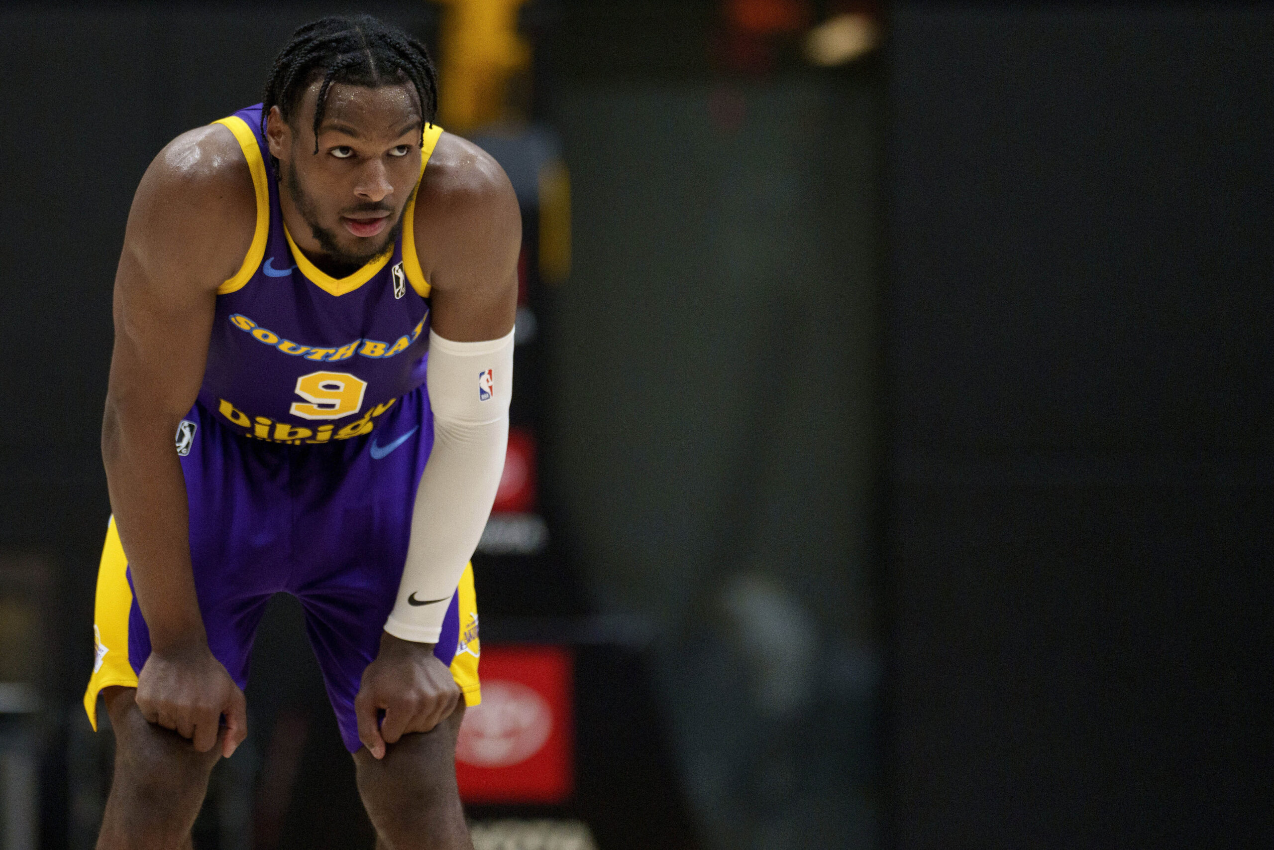 South Bay Lakers guard Bronny James watches a free throw...