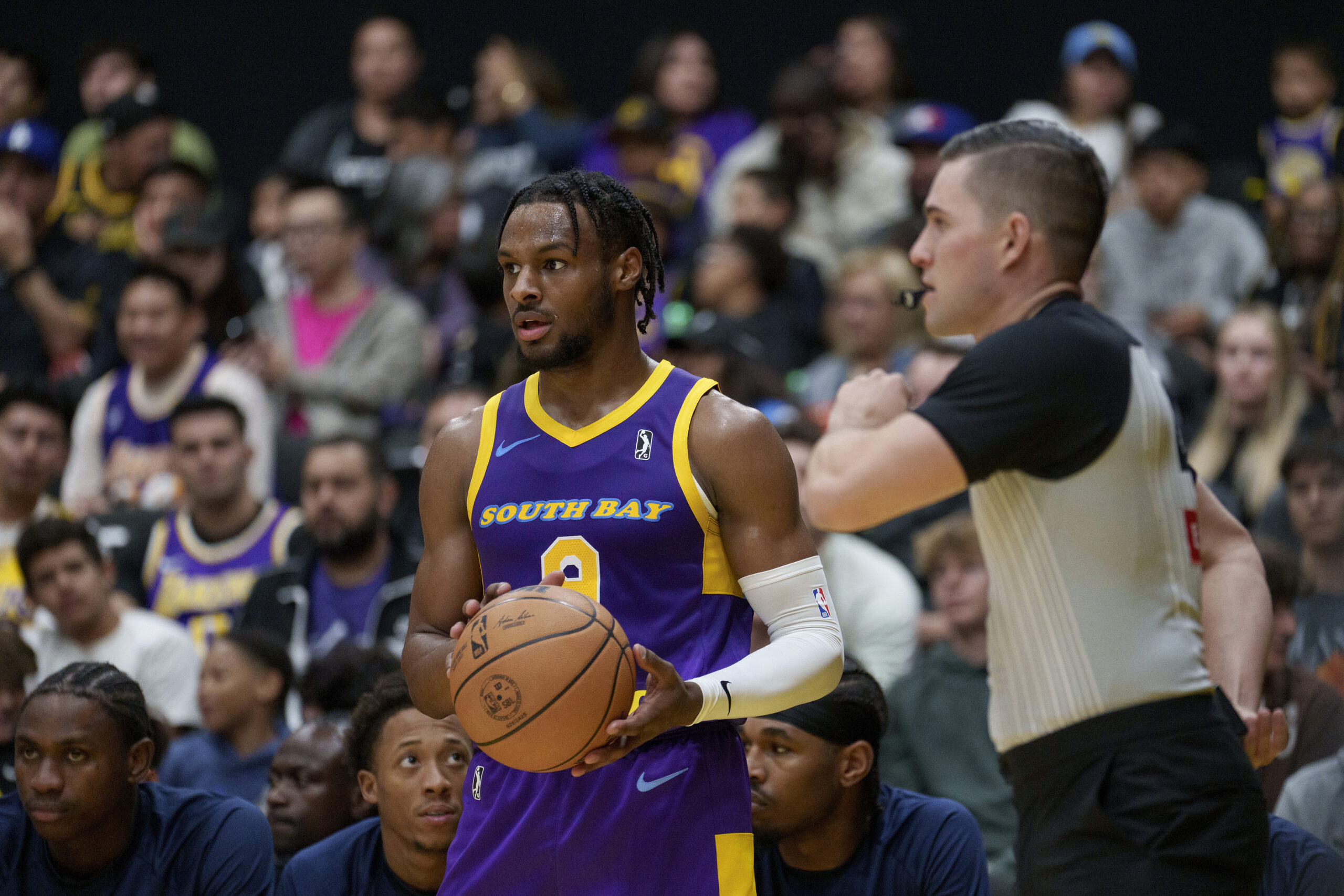 South Bay Lakers guard Bronny James inbounds the ball during...