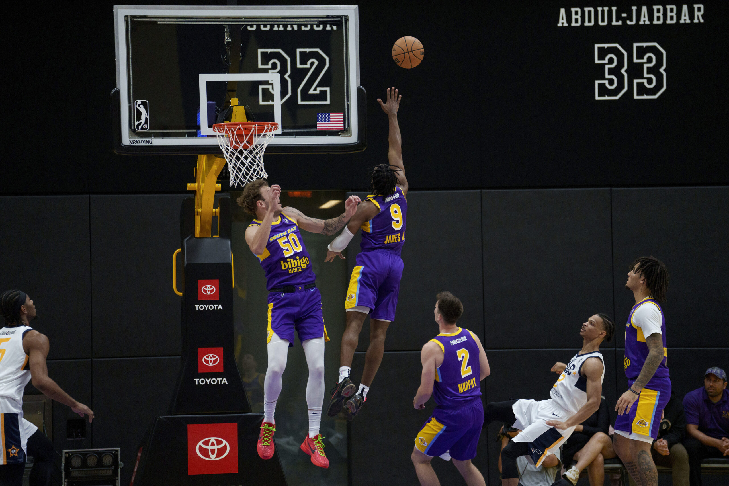 South Bay Lakers guard Bronny James (9) attempts to block...