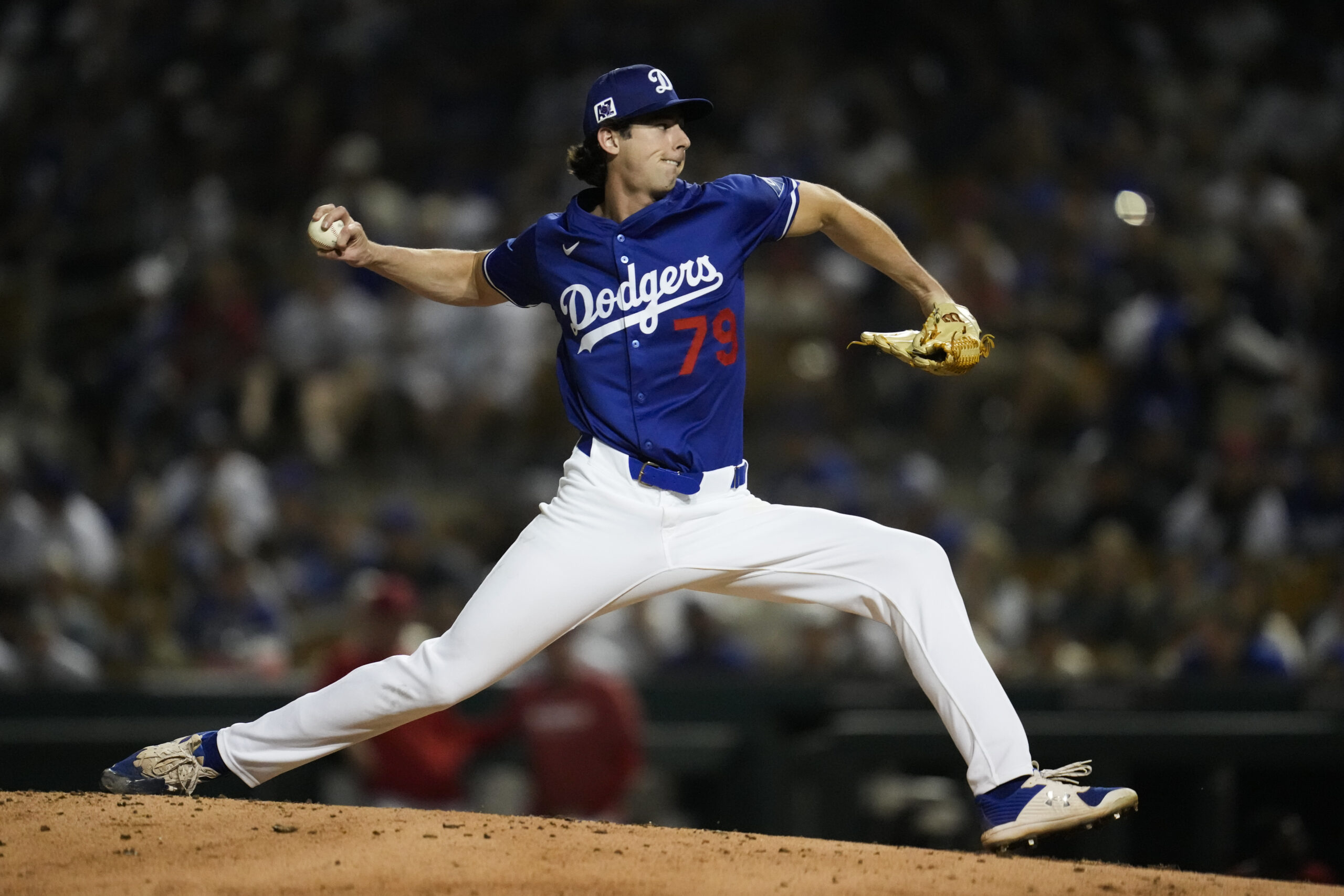 Dodgers relief pitcher Nick Frasso throws during the second inning...