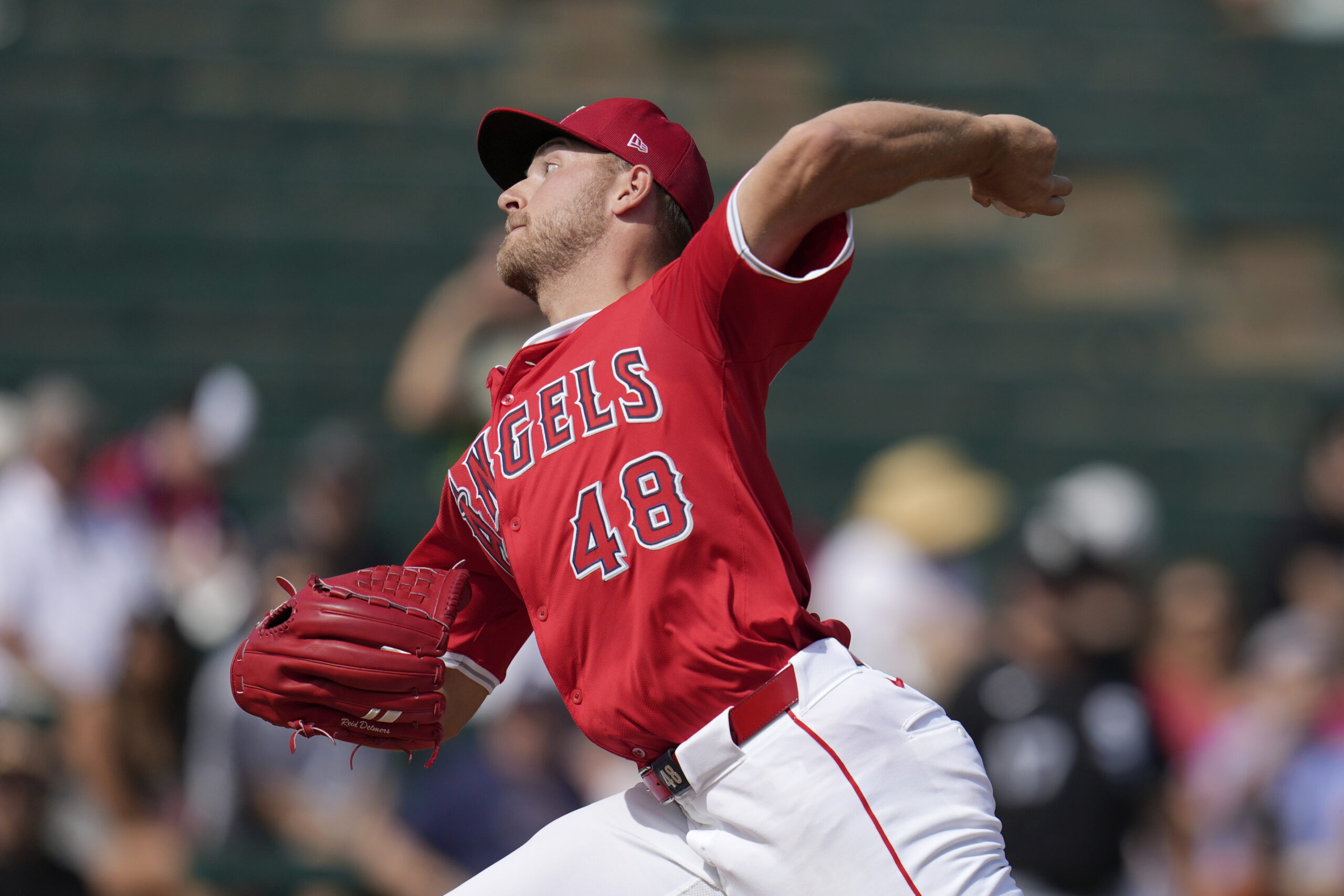 Angels pitcher Reid Detmers throws against the Chicago White Sox...