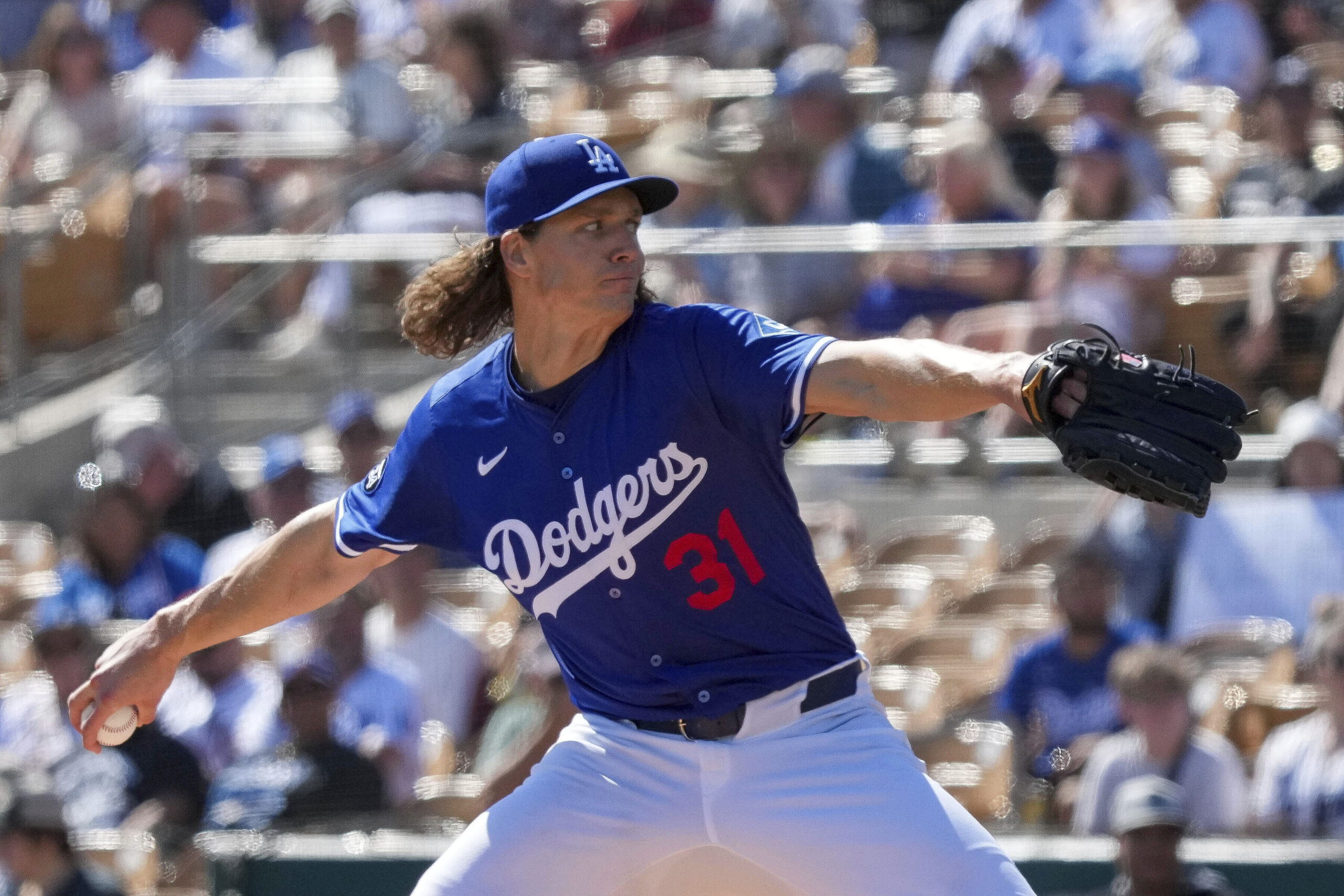 Dodgers pitcher Tyler Glasnow throws during the first inning of...