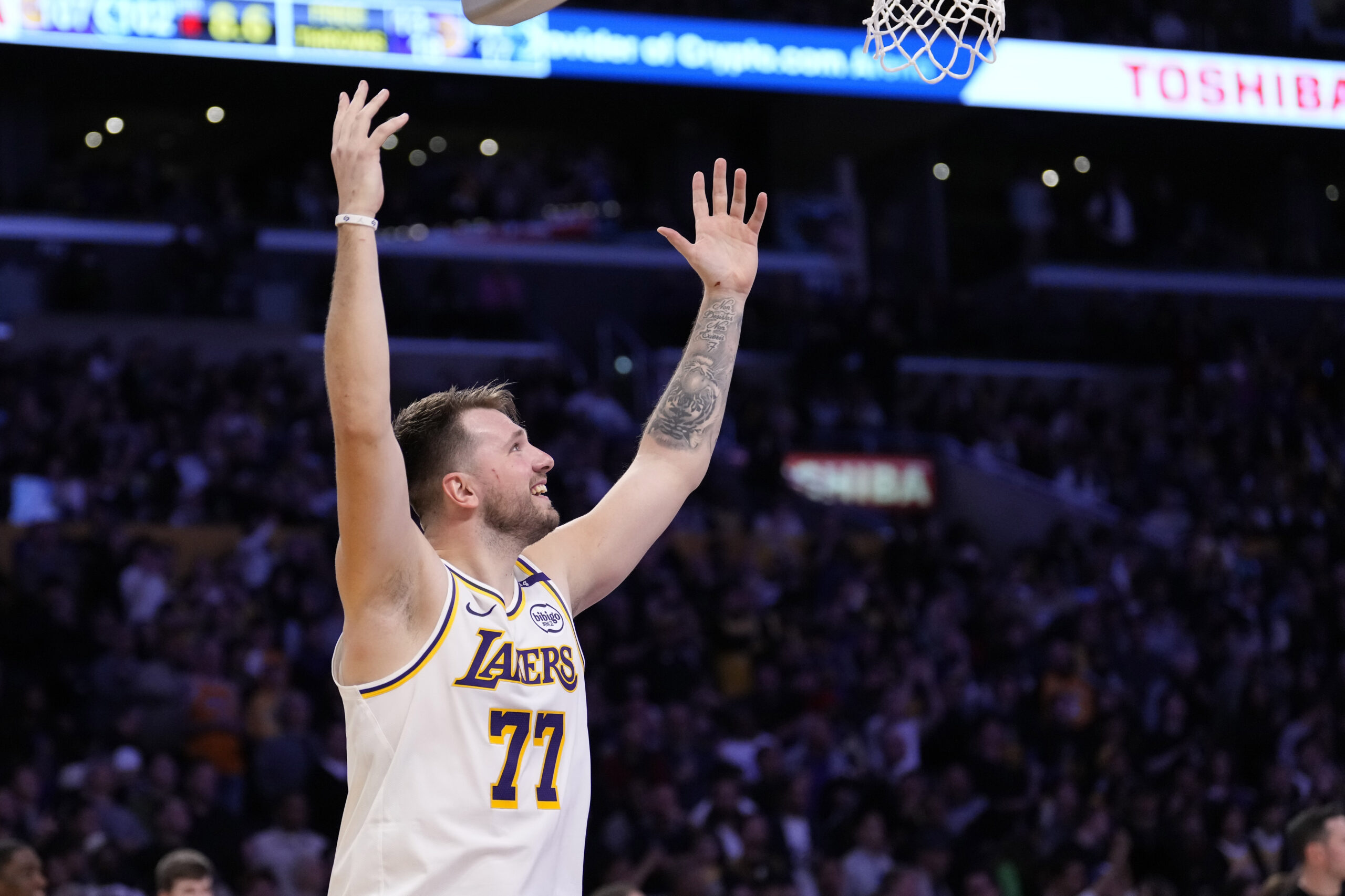 Lakers guard Luka Doncic gestures during the second half of...