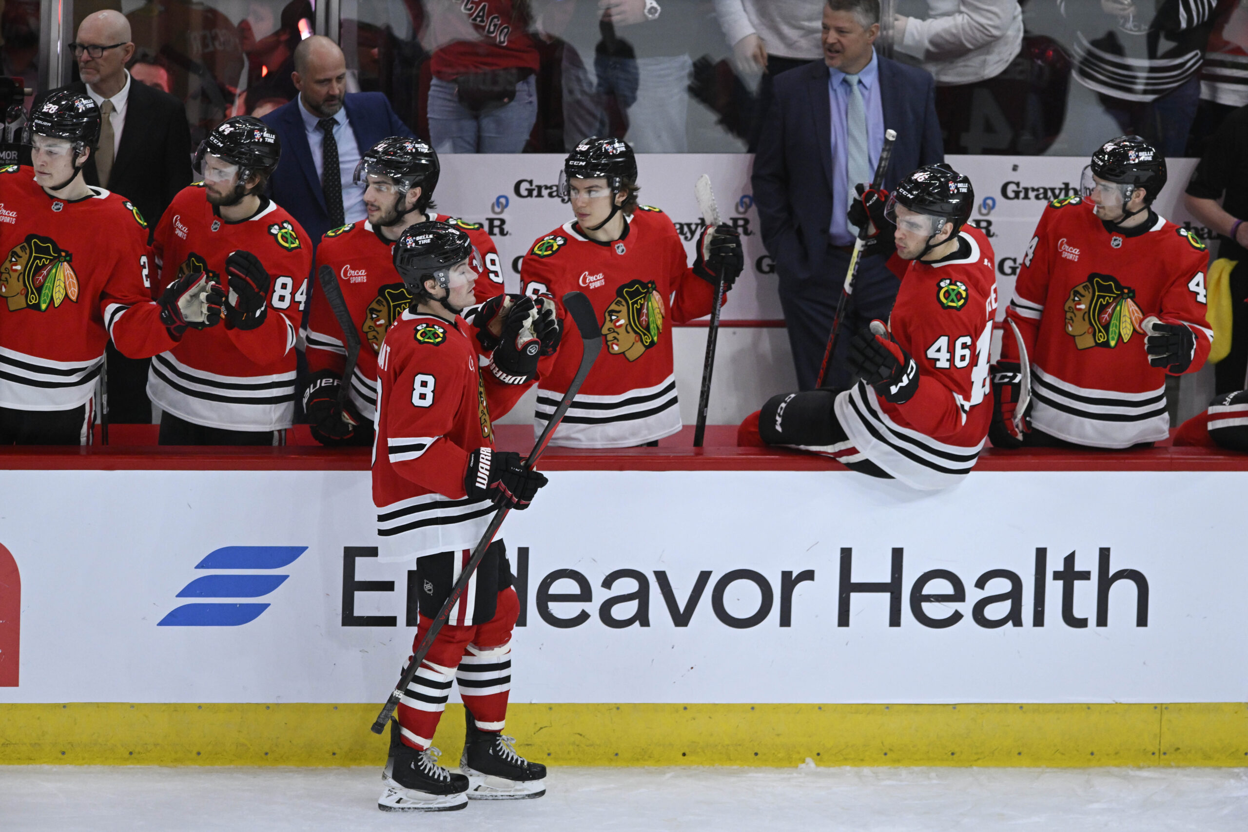 The Chicago Blackhawks’ Ryan Donato (8) celebrates with teammates at...