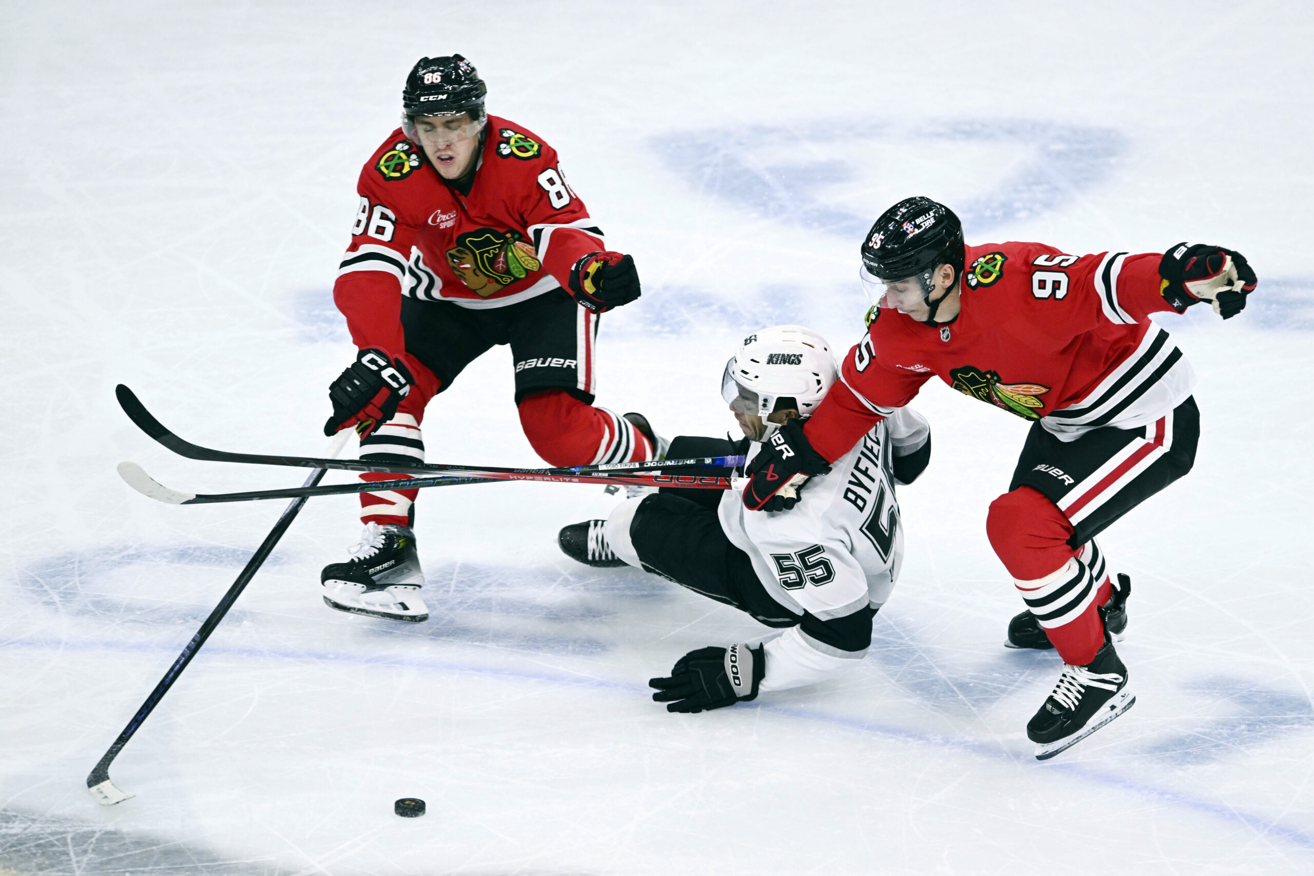 The Kings’ Quinton Byfield (55) battles the Chicago Blackhawks’ Teuvo...