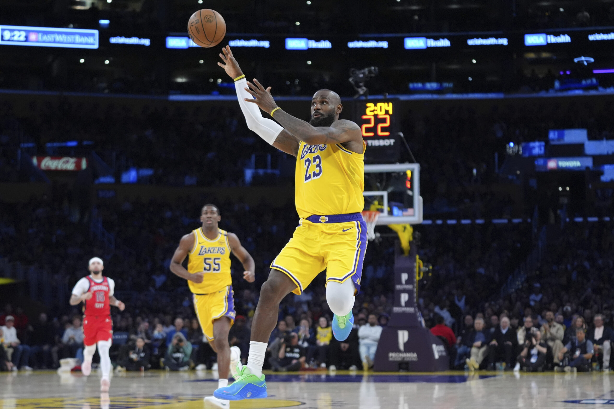 Lakers star LeBron James passes the ball during the second...