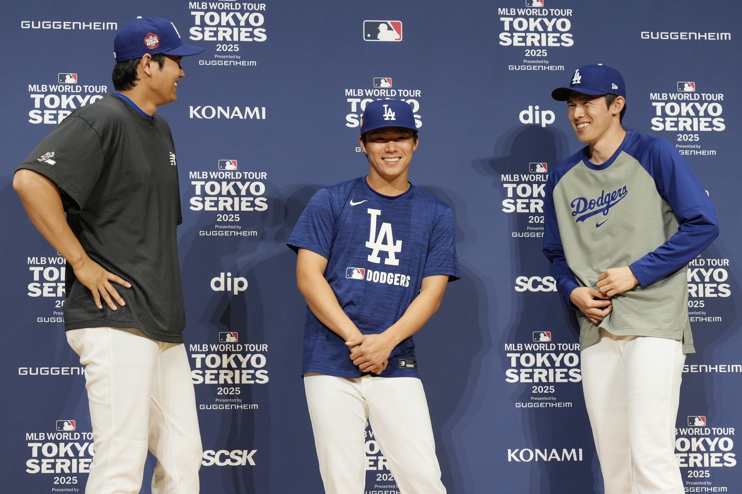 The Dodgers Shohei Ohtani, left, Yoshinobu Yamamoto, center, and Roki...