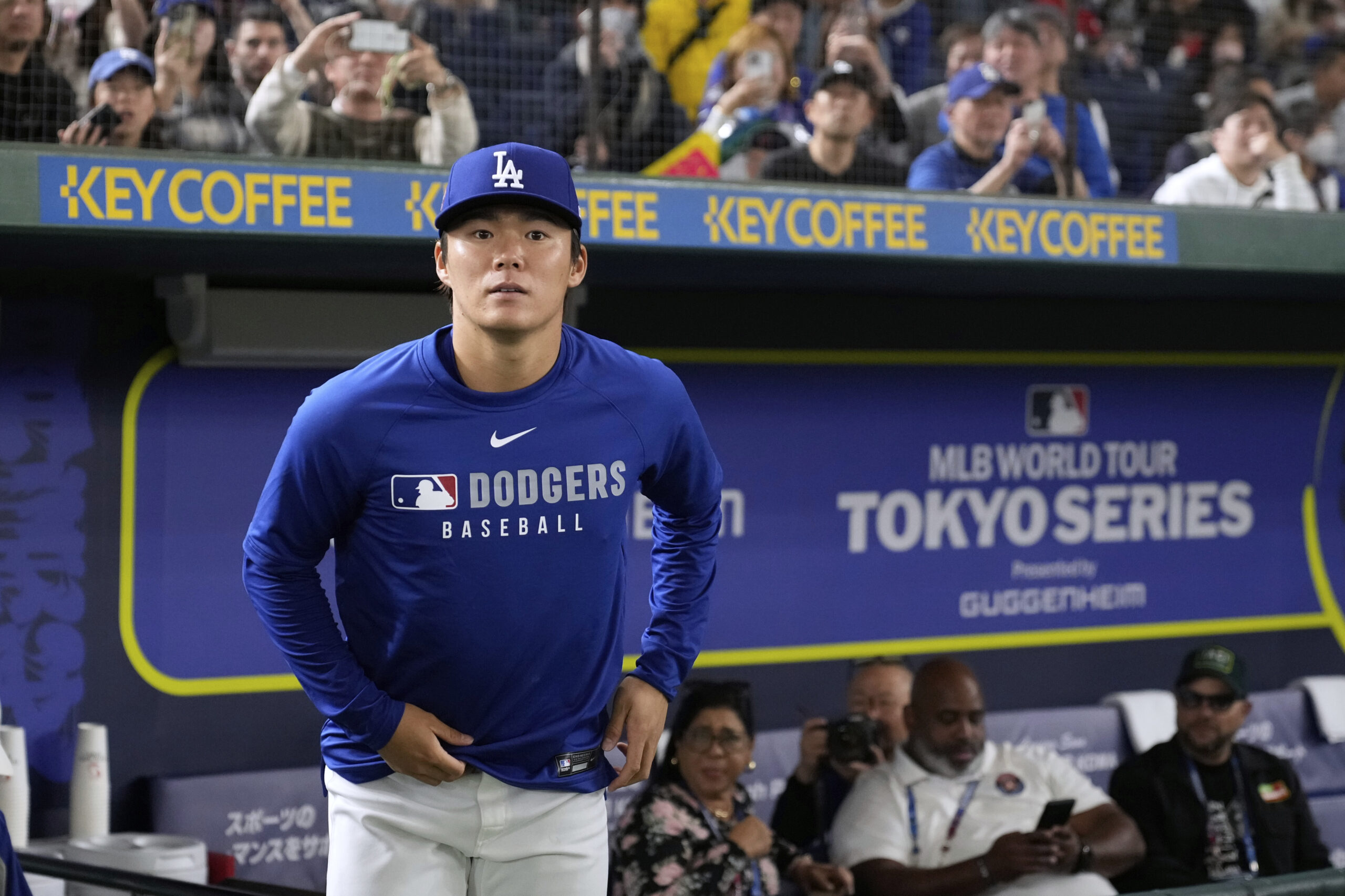 Dodgers pitcher Yoshinobu Yamamoto takes the field for a practice...