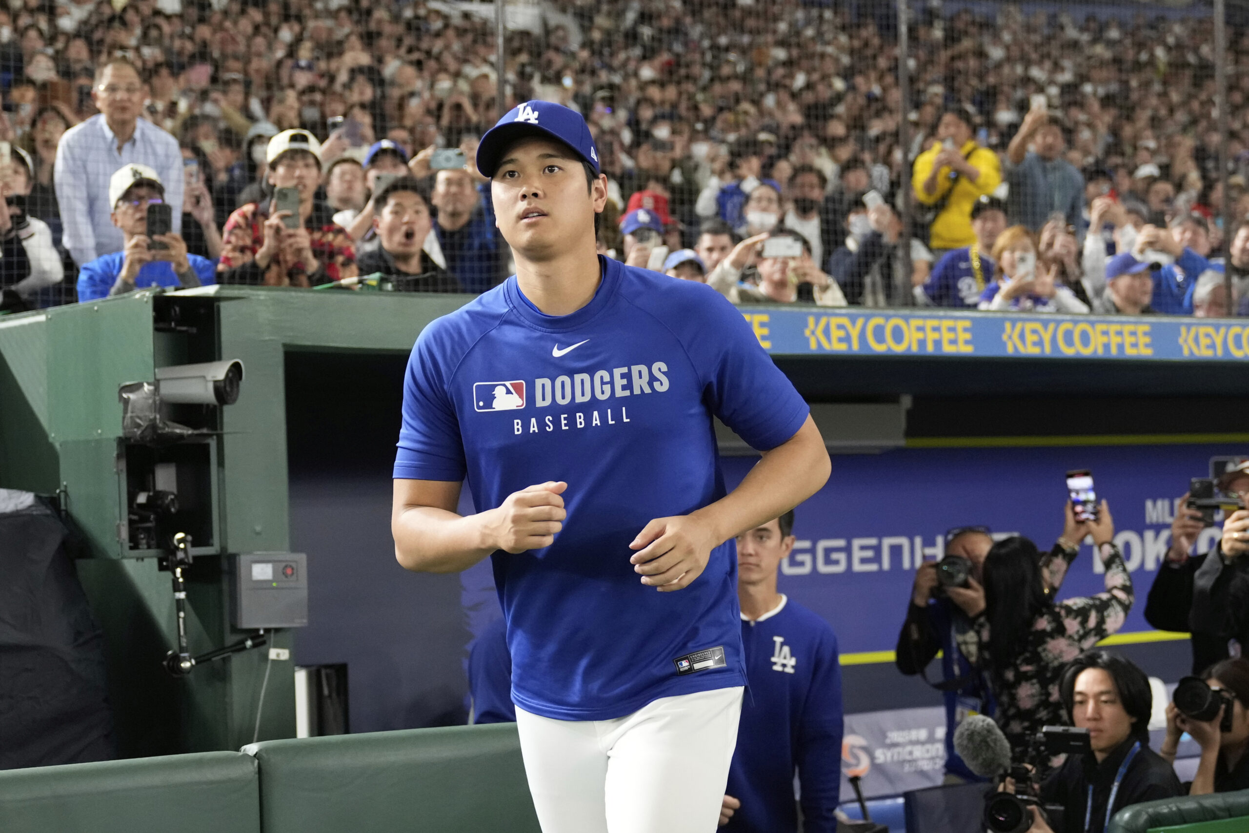 Dodgers star Shohei Ohtani takes the field for a practice...