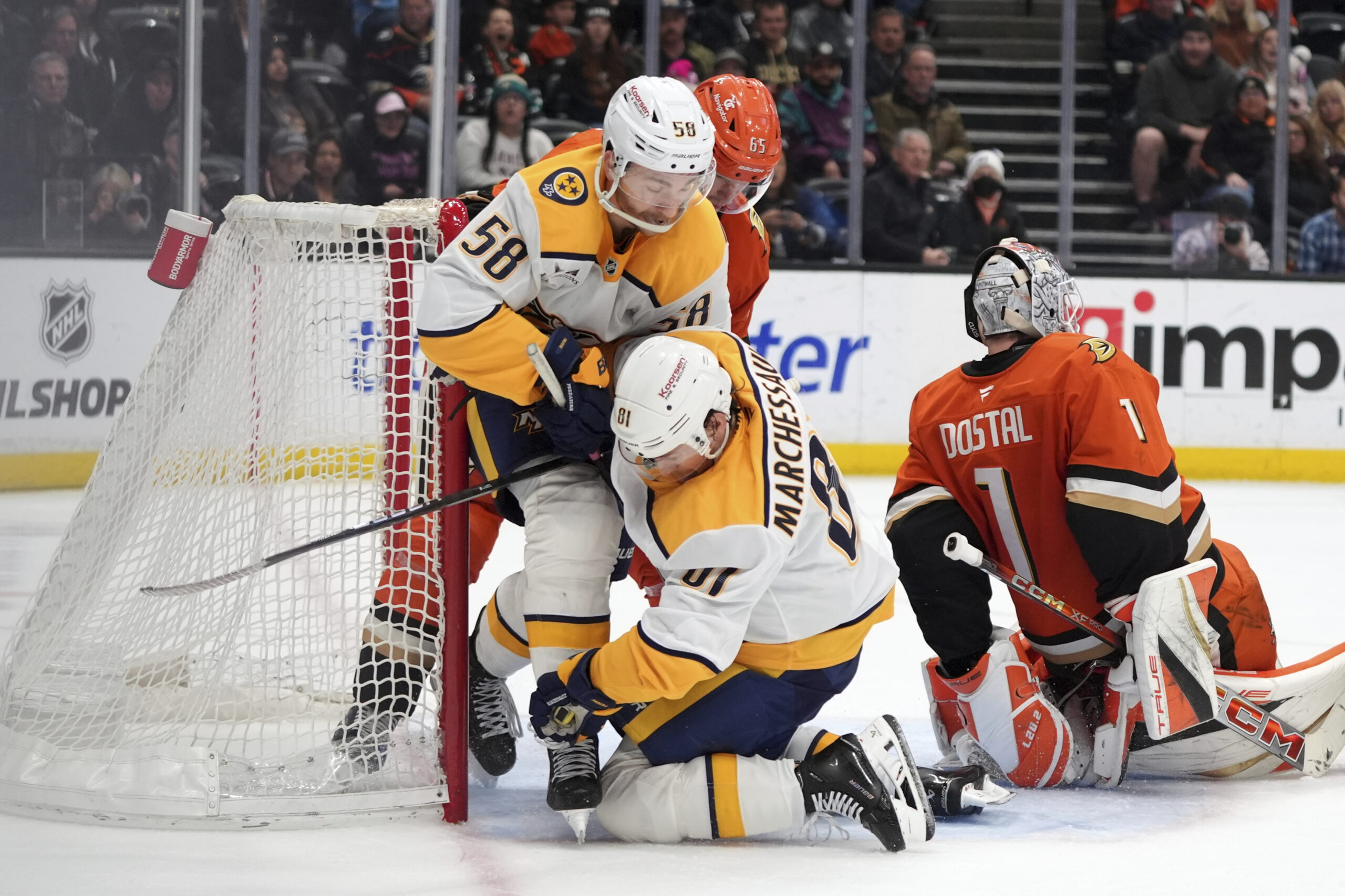 Nashville Predators left wing Michael Bunting (58) and center Jonathan...