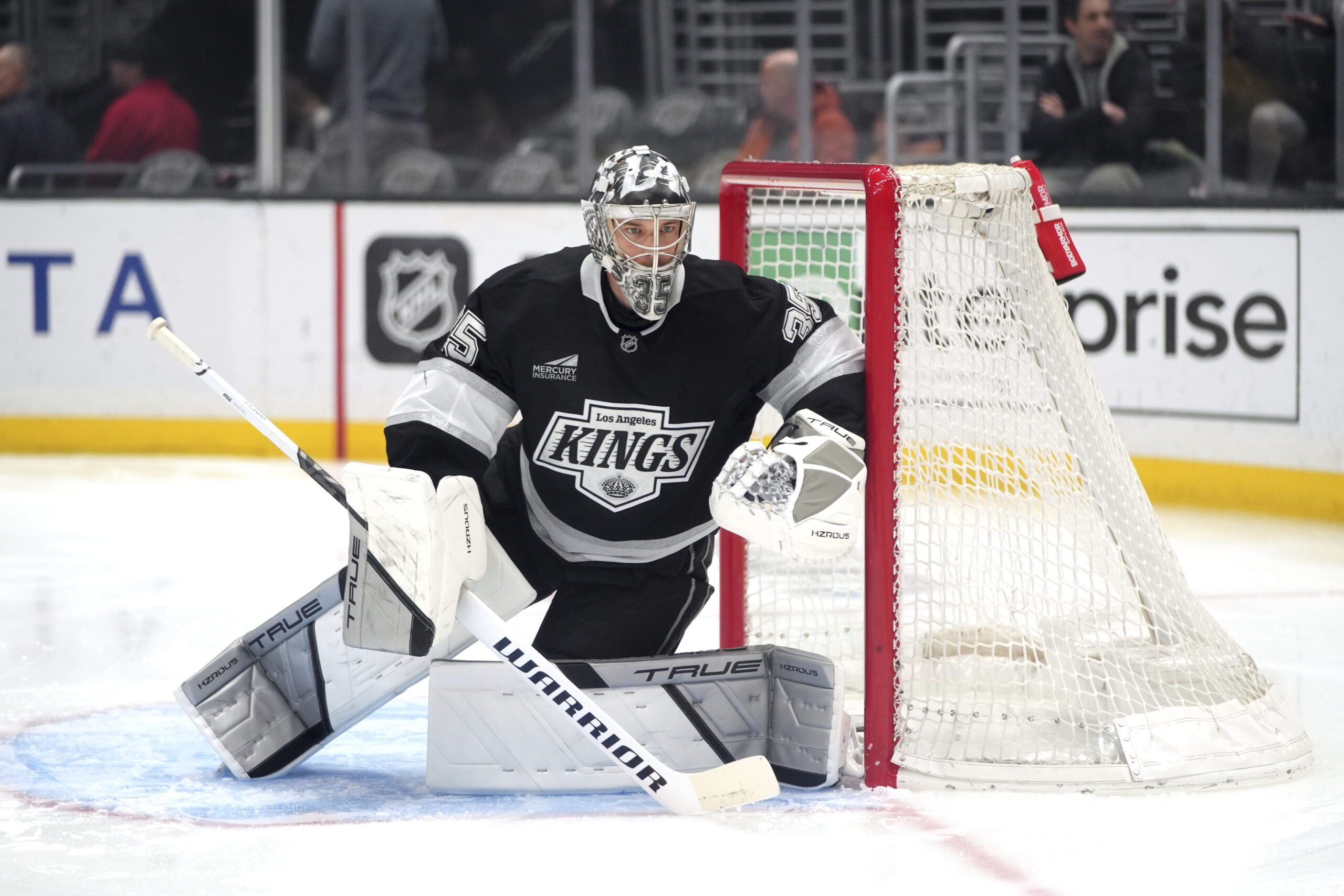 Kings goaltender Darcy Kuemper (35) guards his net during the...