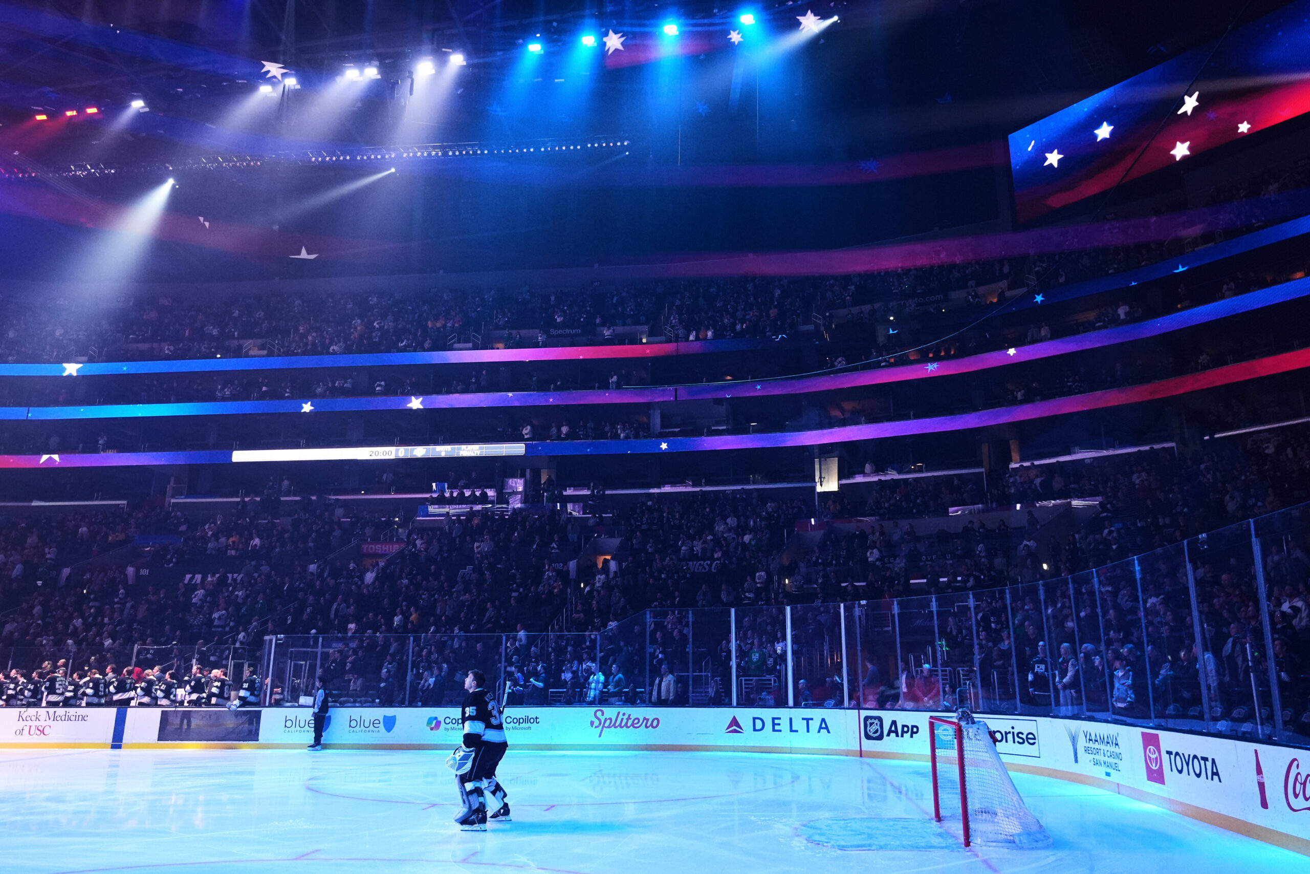 Kings goaltender Darcy Kuemper (35) listens to the national anthem...