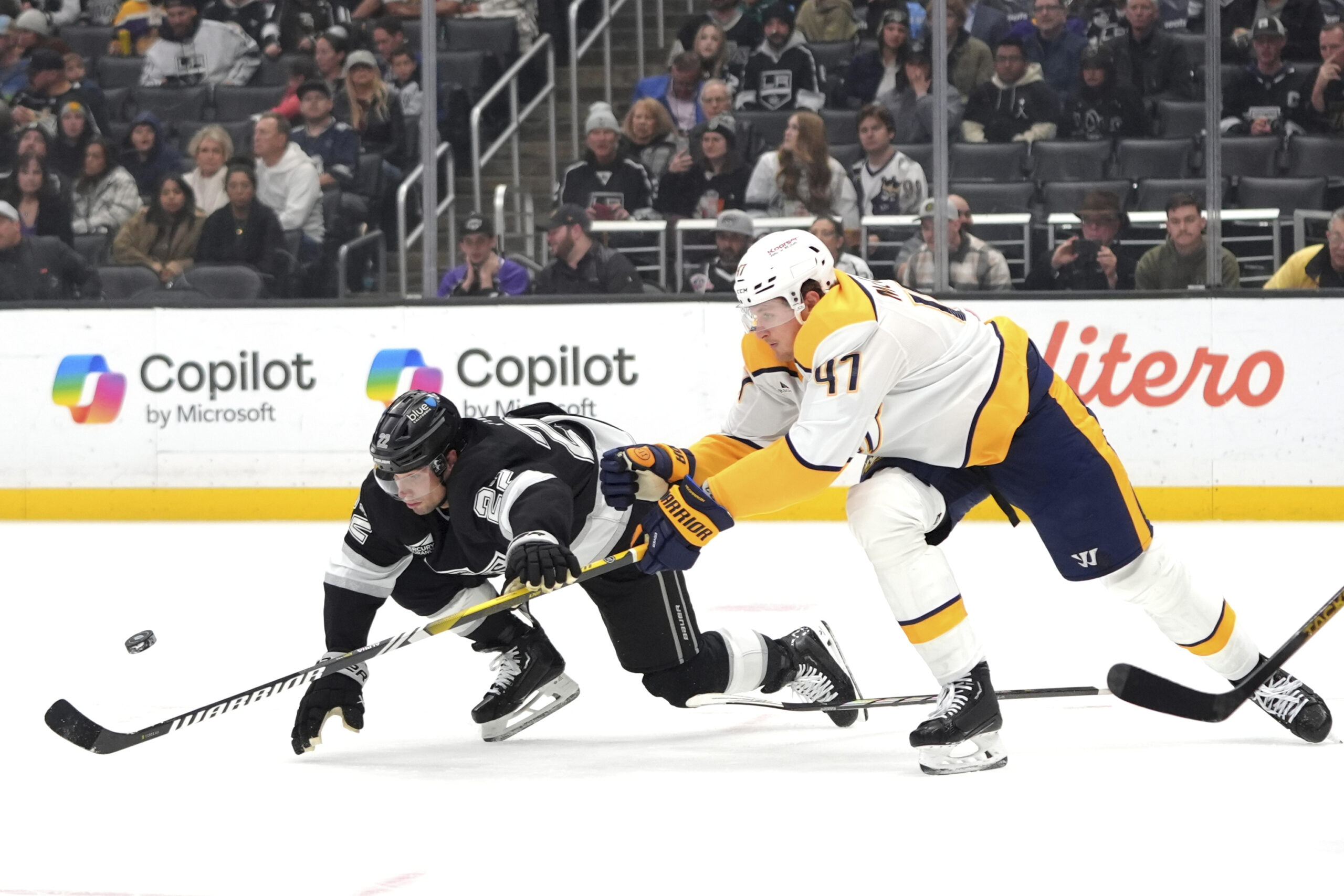 Kings left wing Kevin Fiala (22) grabs the stick of...