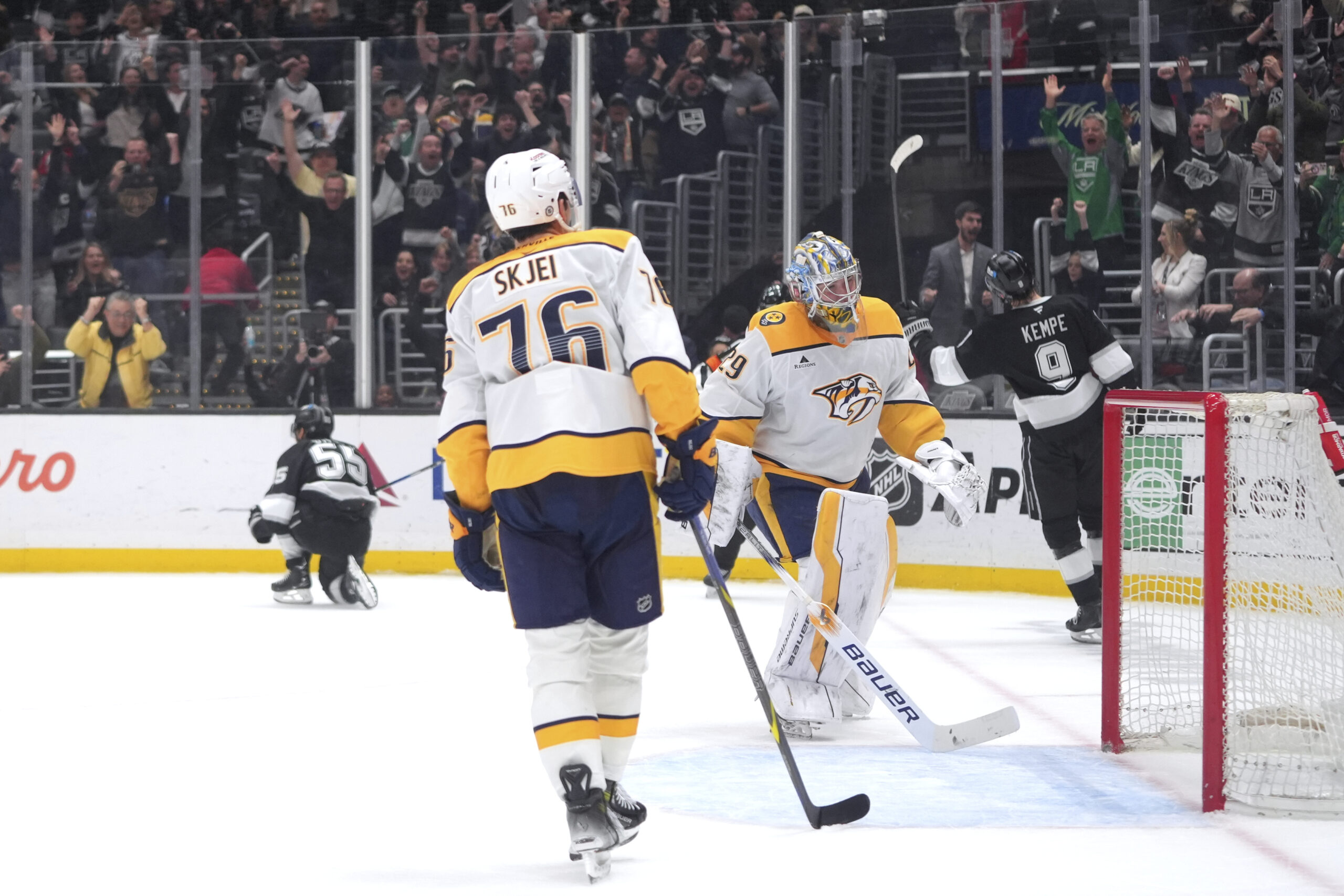 Nashville Predators goaltender Justus Annunen (29) and defenseman Brady Skjei...