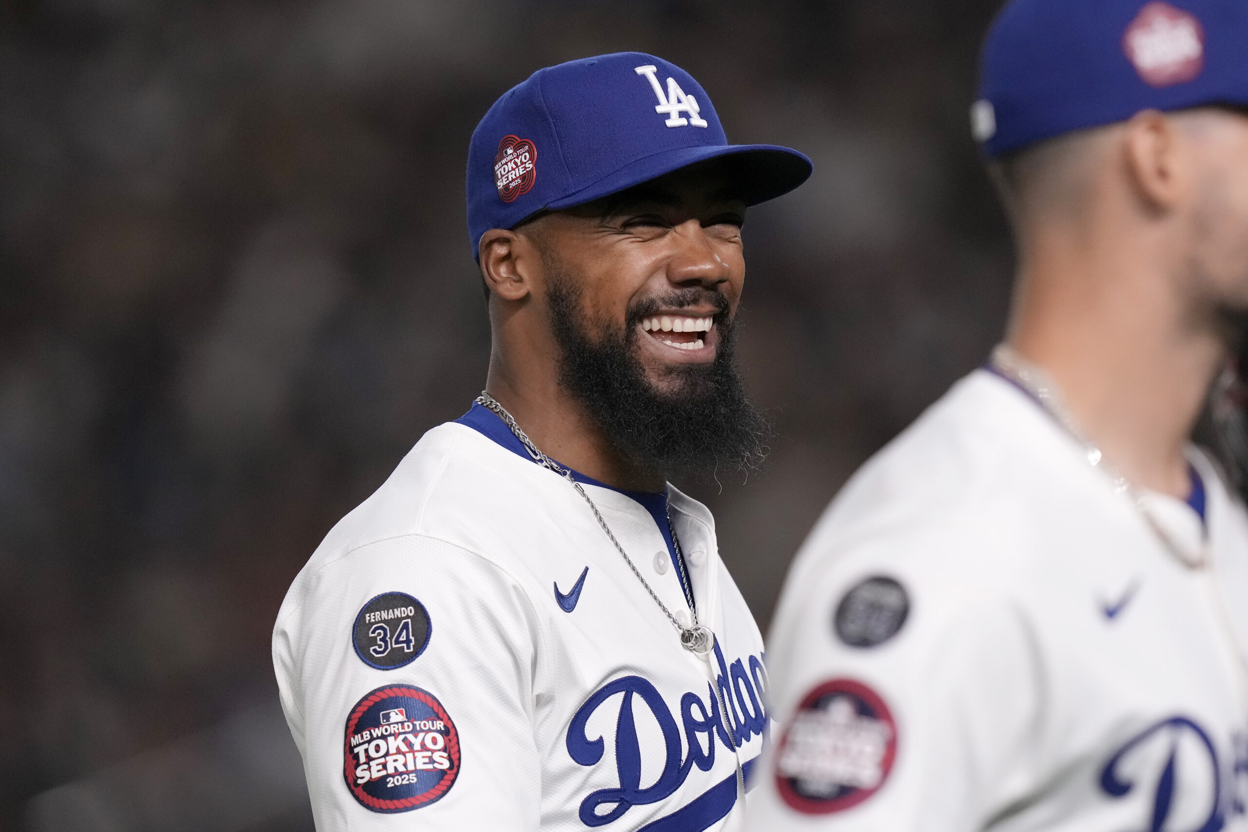 Dodgers outfielder Teoscar Hernández smiles during the second inning in...