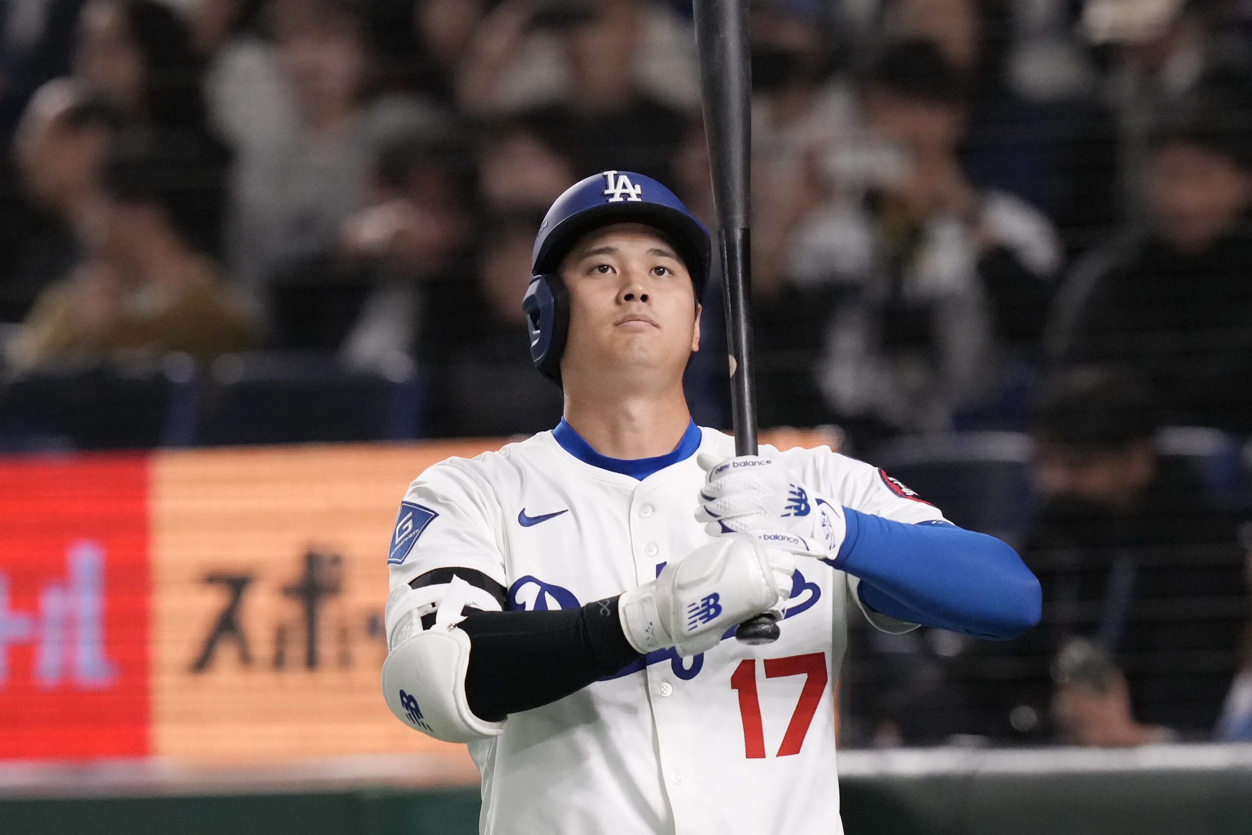 Dodgers star Shohei Ohtani prepares to bat against the Hanshin...