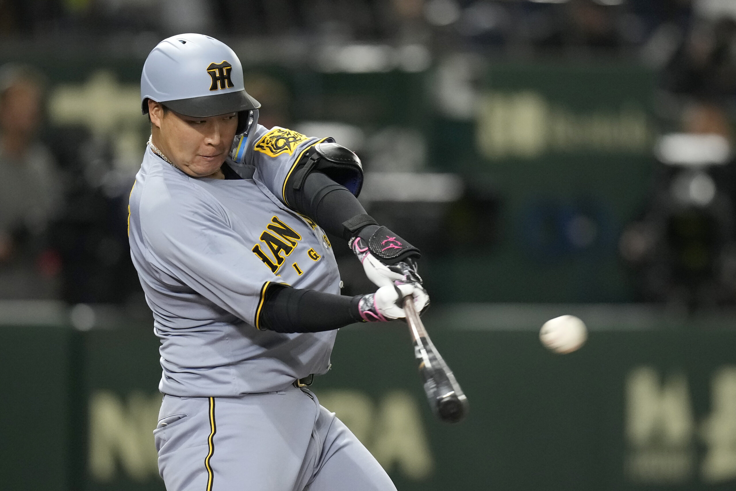 The Hanshin Tigers’ Yusuke Ohyama flies out against the Dodgers...