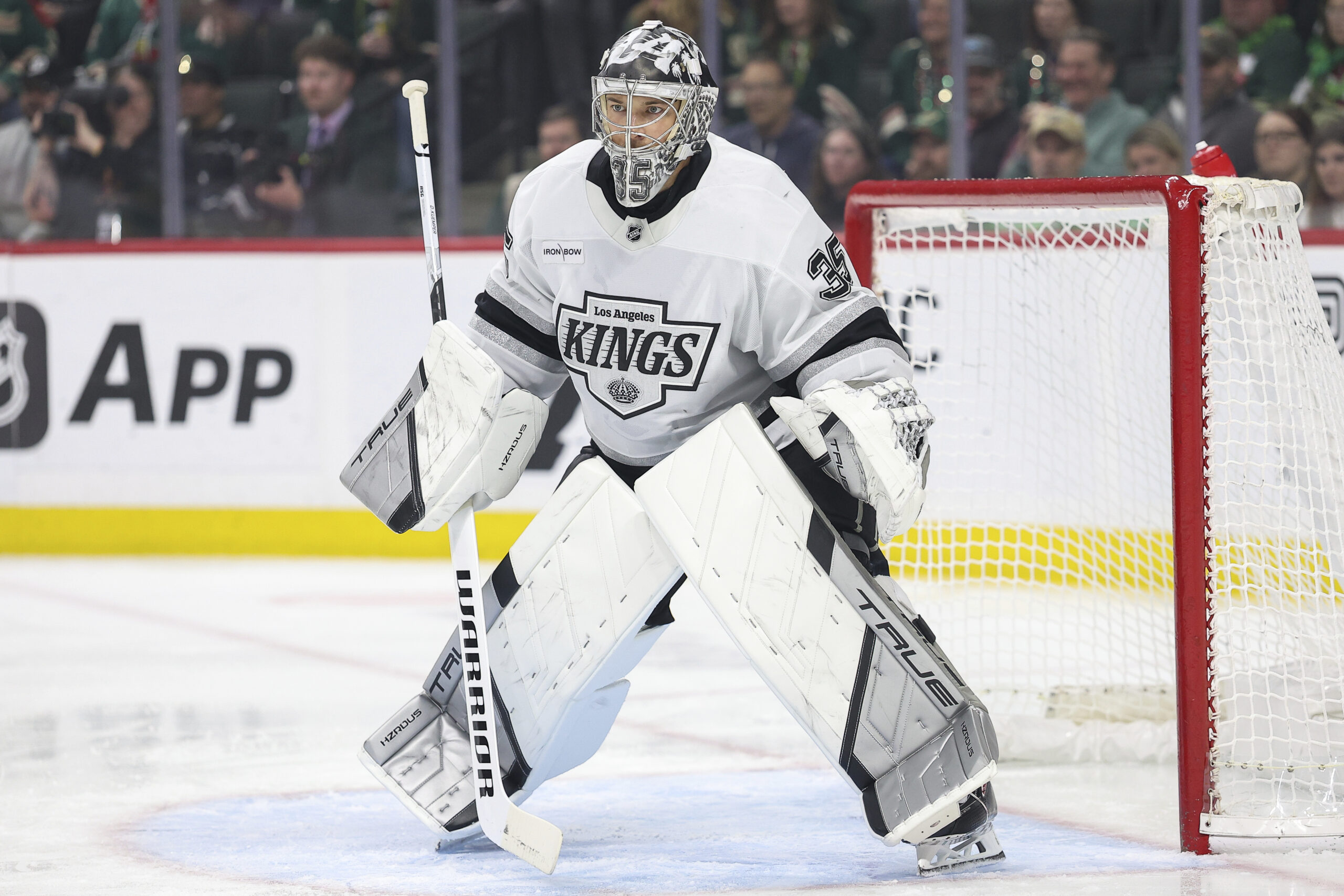 Kings goaltender Darcy Kuemper defends his net against the Minnesota...