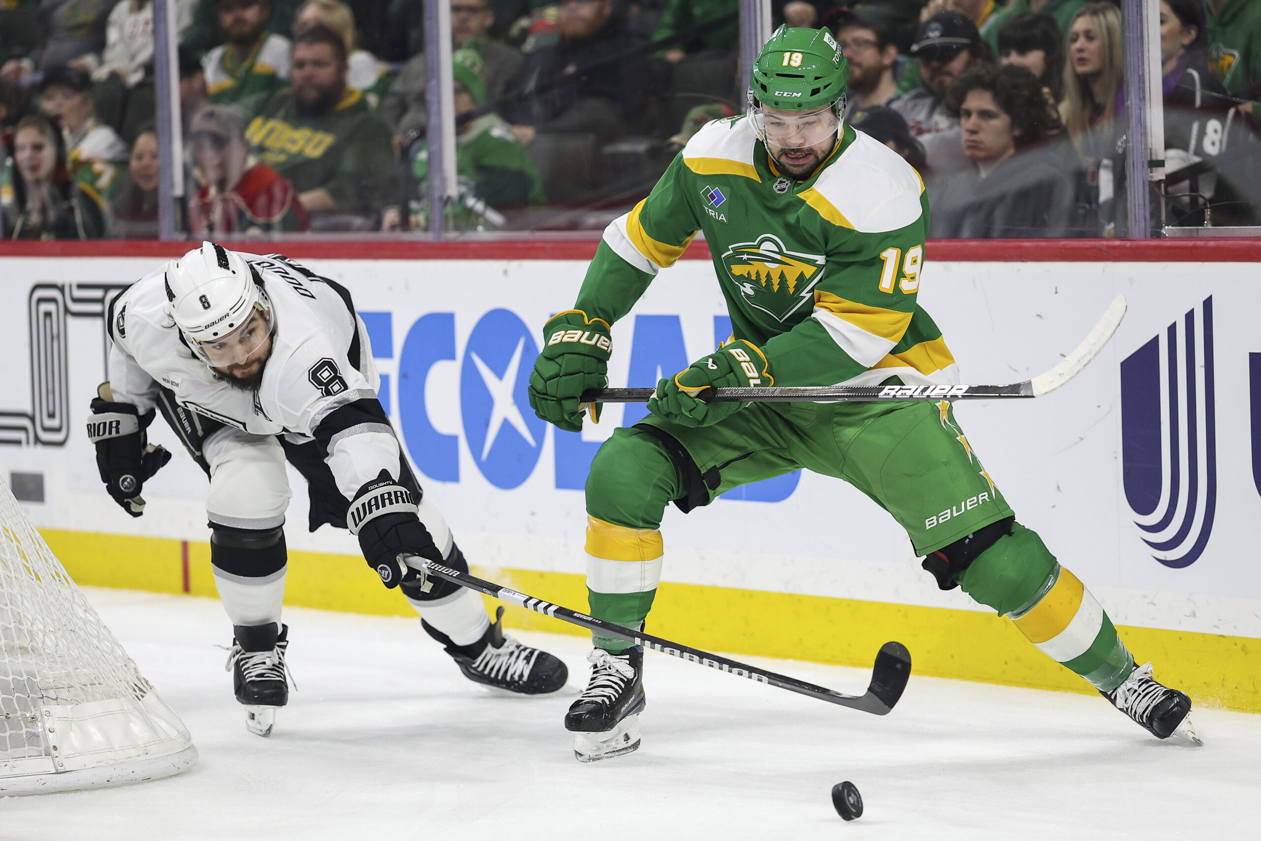 Minnesota Wild center Devin Shore, right, and Kings defenseman Drew...