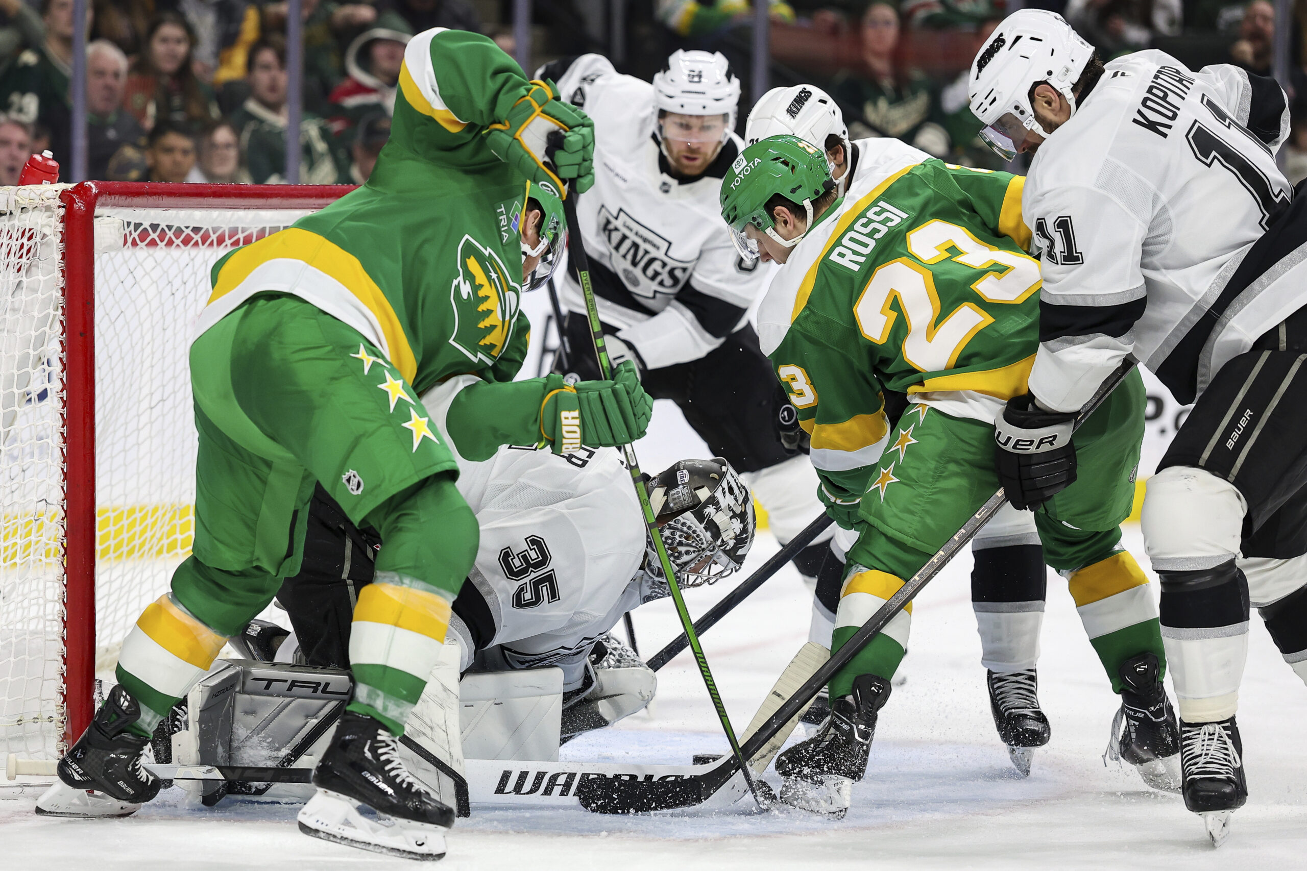 Kings goaltender Darcy Kuemper (35) defends his net against the...