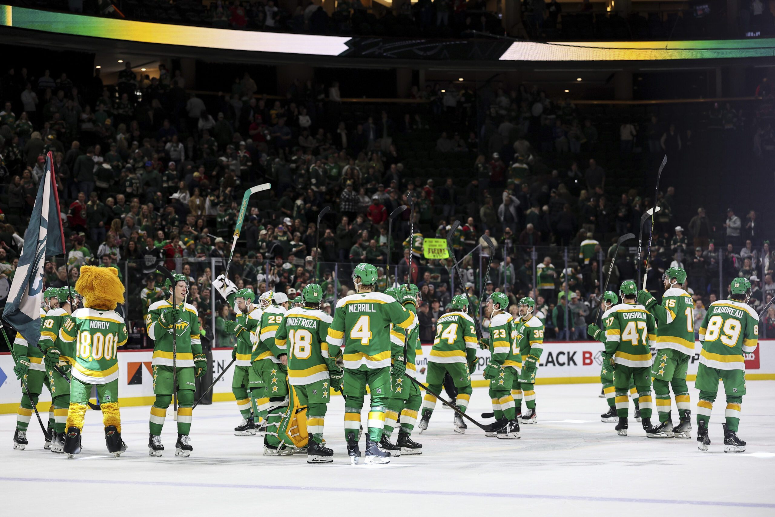 Minnesota Wild players celebrate after their 3-1 victory over the...