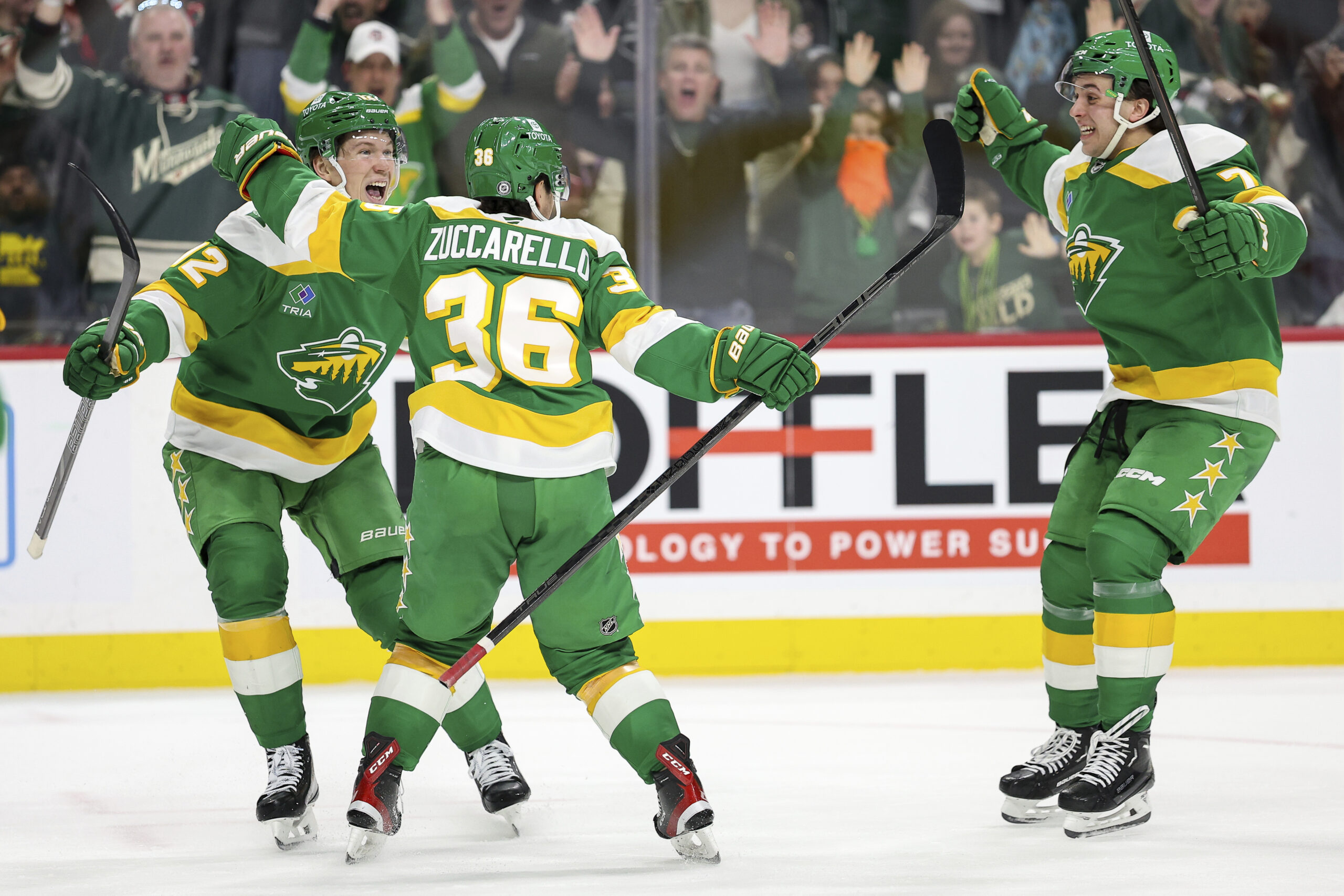 Minnesota Wild right wing Mats Zuccarello (36) celebrates with left...